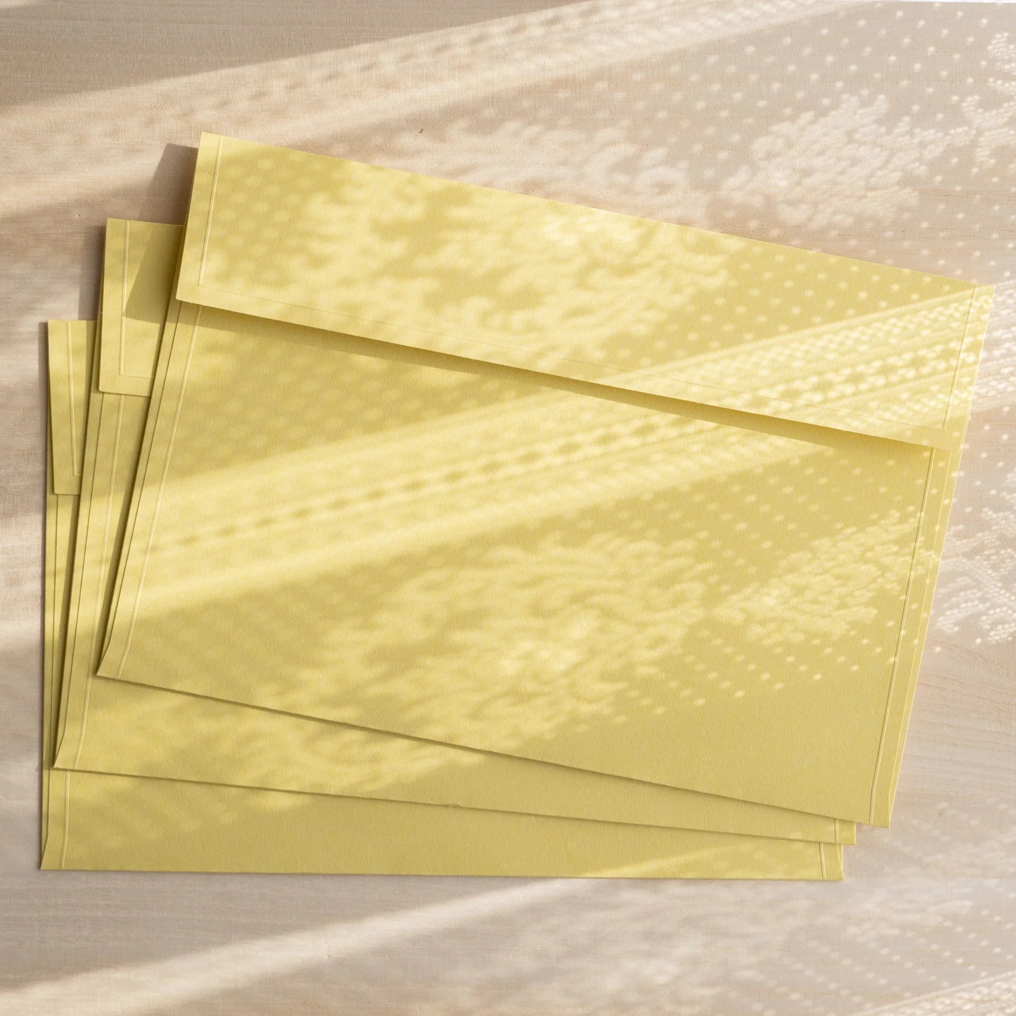 Dressco ivory large embossed envelope image thirty-two, back view showing flap closure, with embossed pattern, set of three