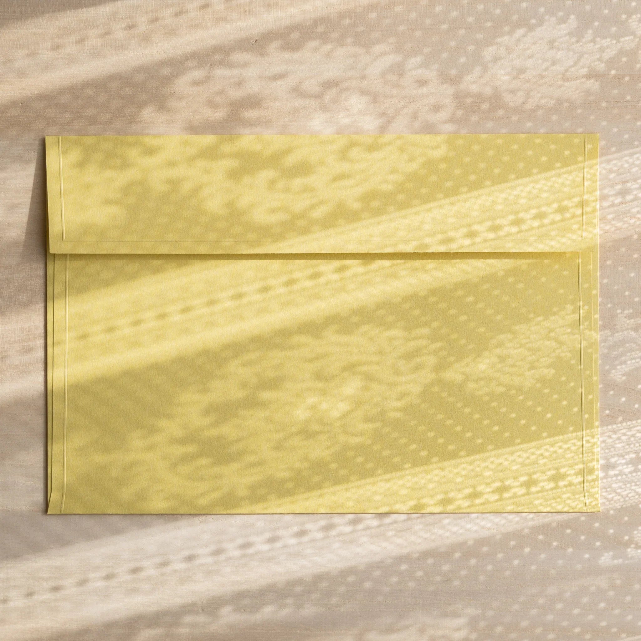 Dressco ivory large embossed envelope image thirty-three, left angled side view, with embossed finish, set of three