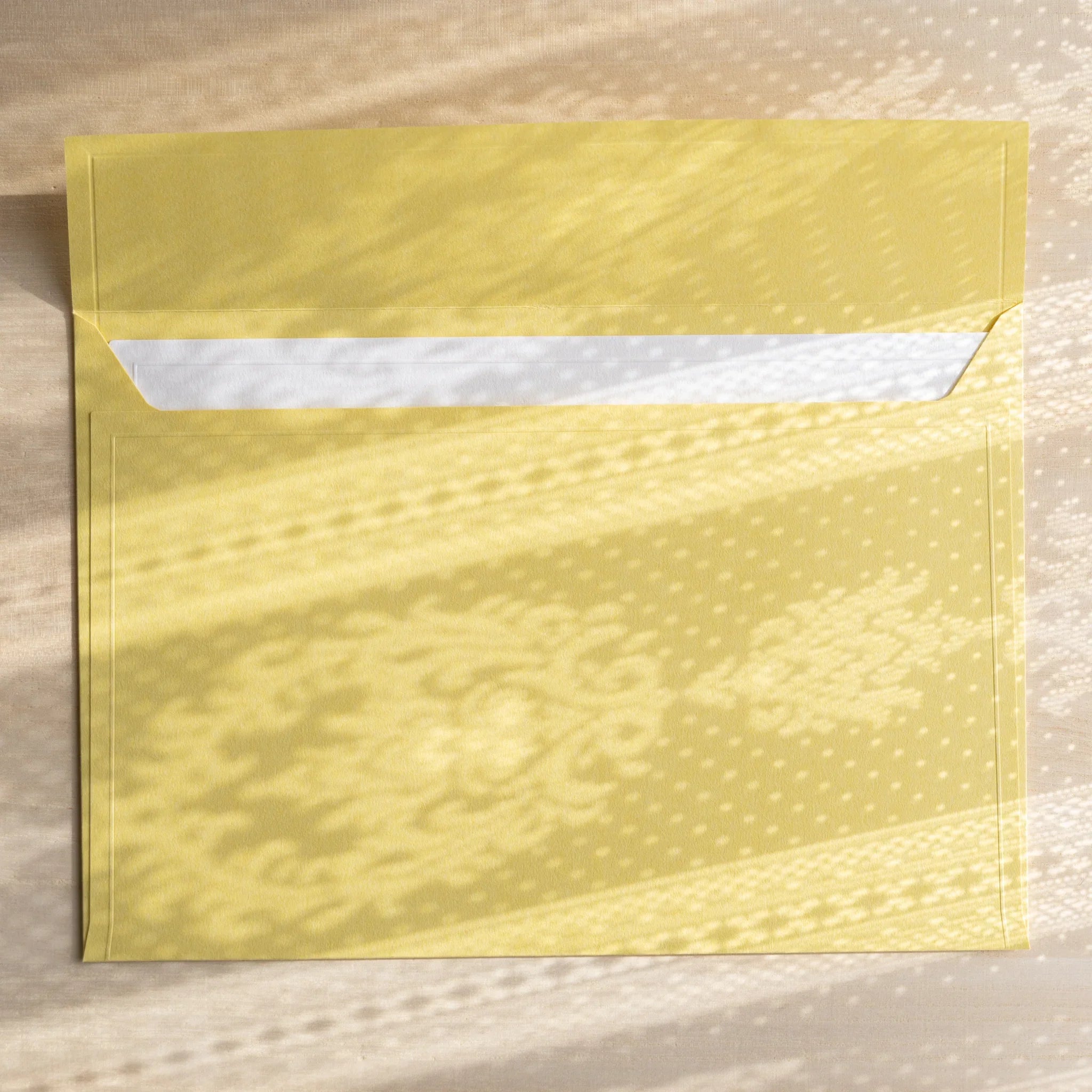 Dressco ivory large embossed envelope image thirty-eight, corner detail view, with embossing design, set of three