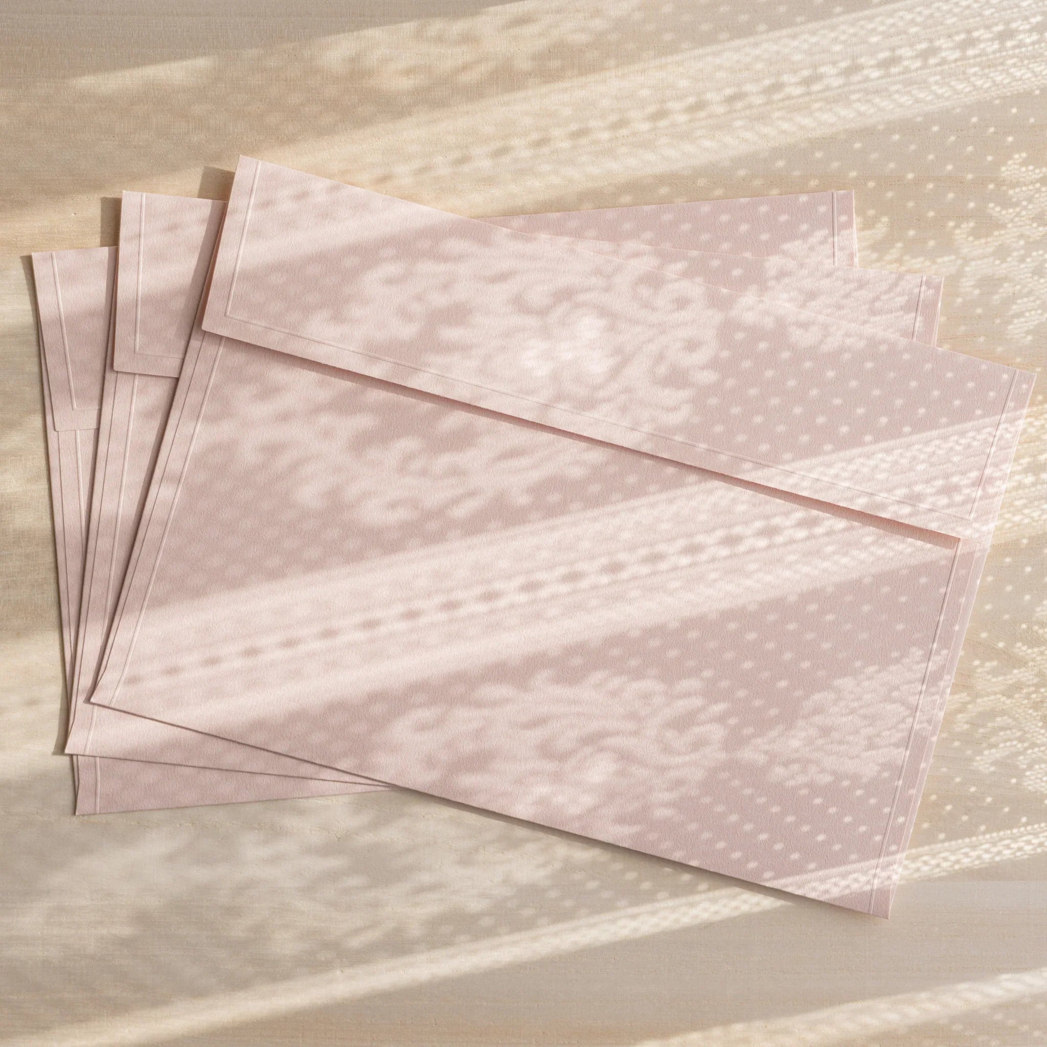 Dressco ivory large embossed envelope image forty-four, right angled side view, with embossing detail, set of three