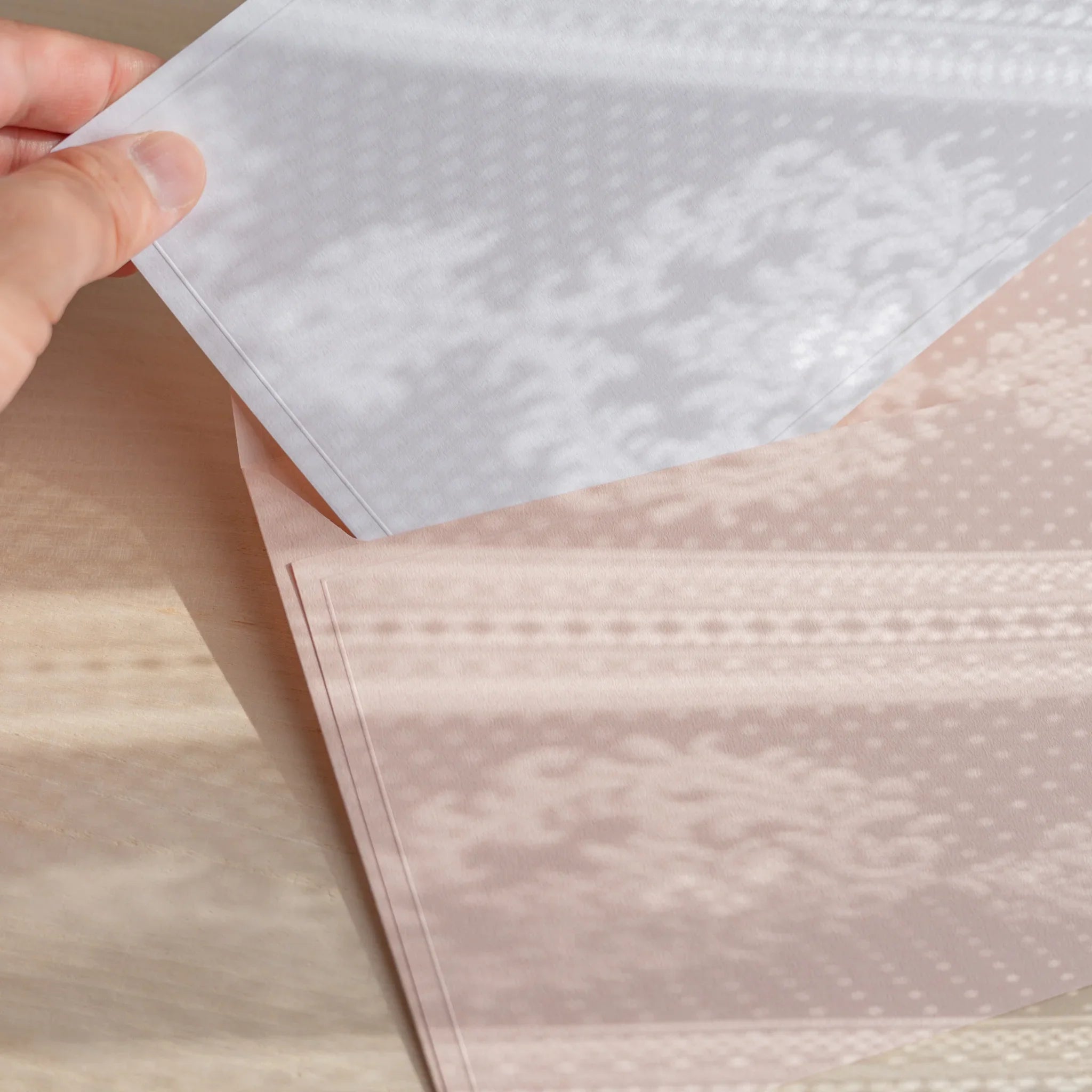 Dressco ivory large embossed envelope image forty-nine, fanned display layout, with embossed paper, set of three