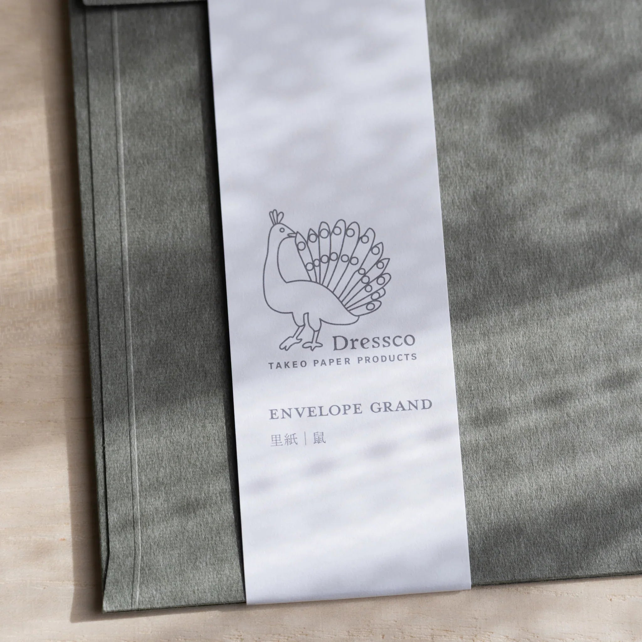 Dressco ivory large embossed envelope image fifty-five, overhead flat composition, with embossed surface, set of three