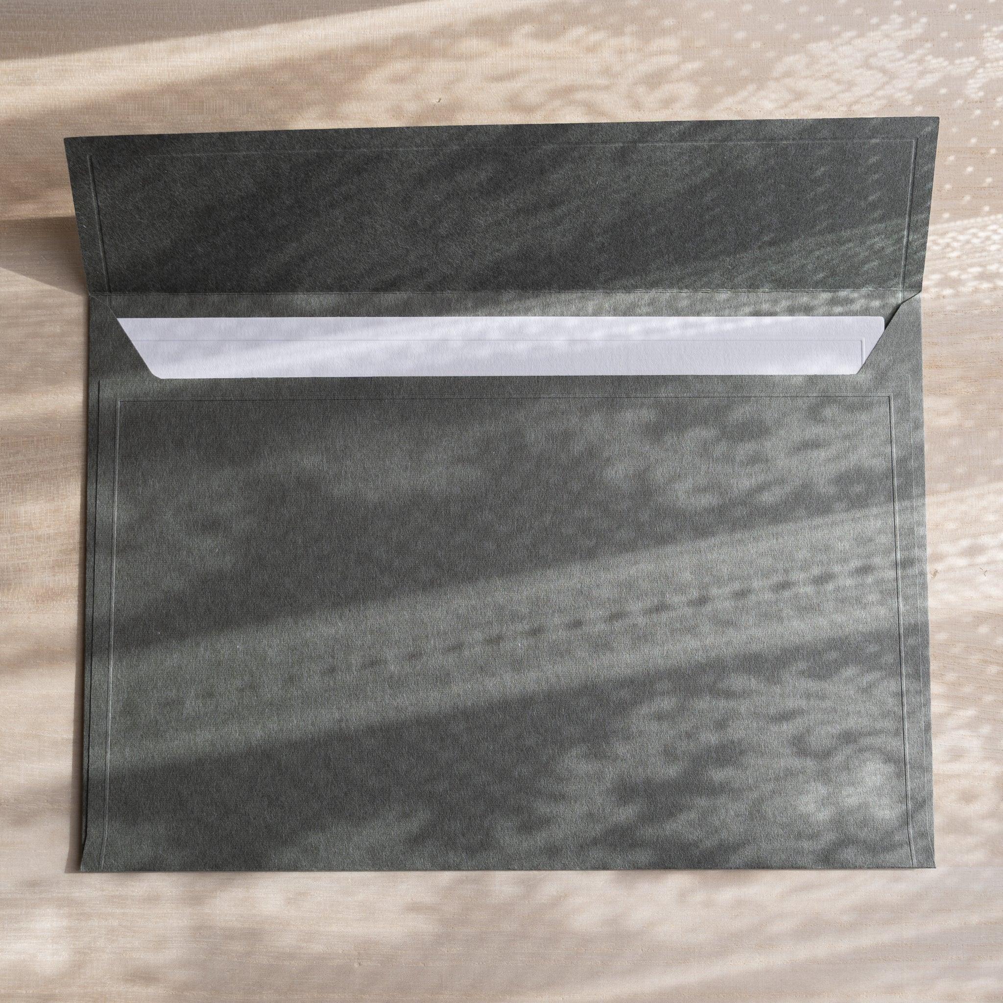 Dressco ivory large embossed envelope image sixty-two, back view showing flap closure, with embossed pattern, set of three