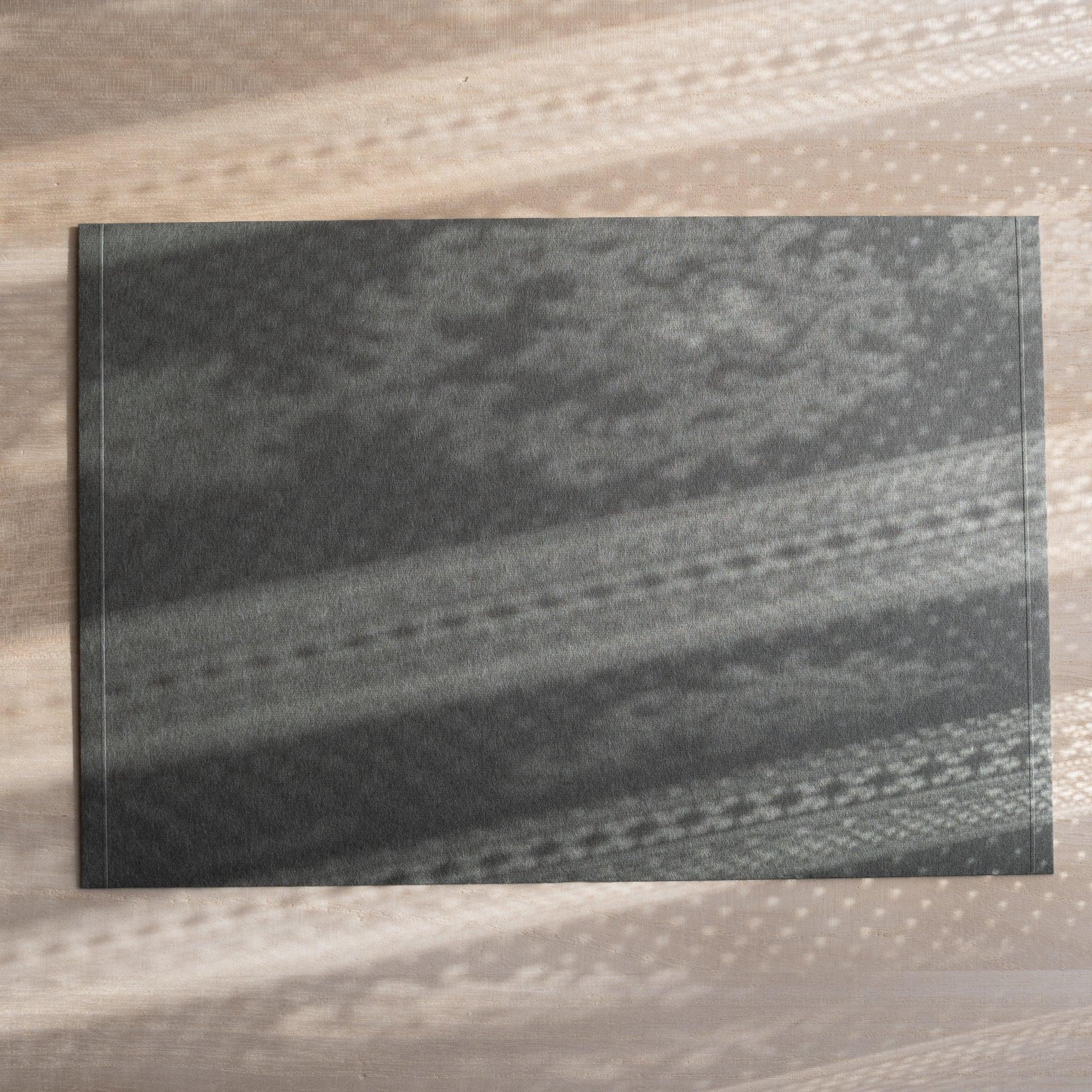 Dressco ivory large embossed envelope image sixty-three, left angled side view, with embossed finish, set of three