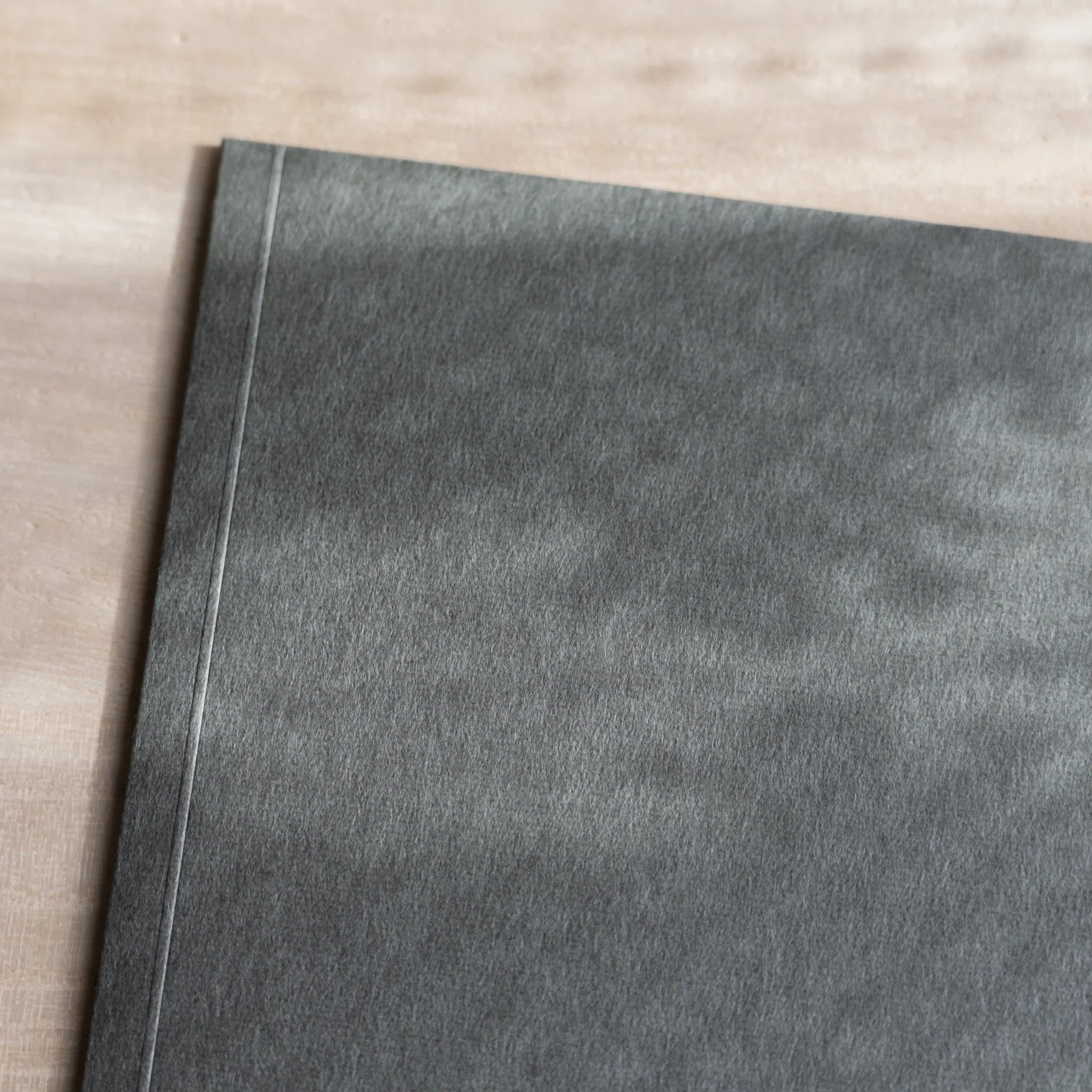 Dressco ivory large embossed envelope image sixty-four, right angled side view, with embossing detail, set of three