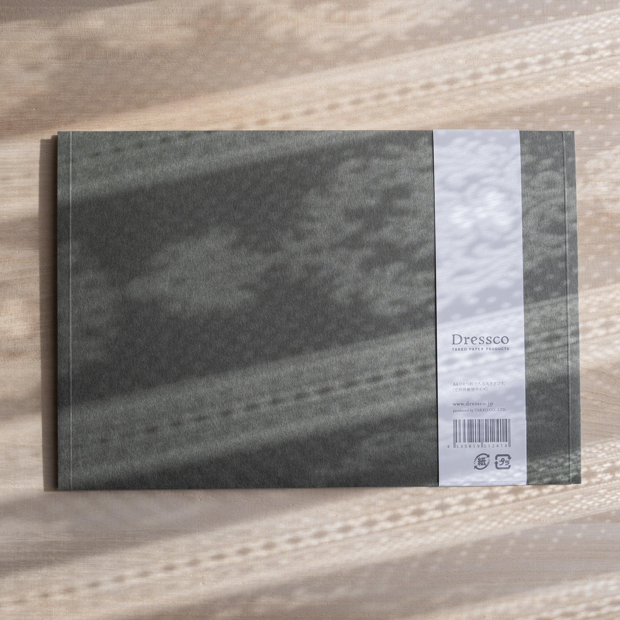 Dressco ivory large embossed envelope image sixty-five, overhead flat composition, with embossed surface, set of three