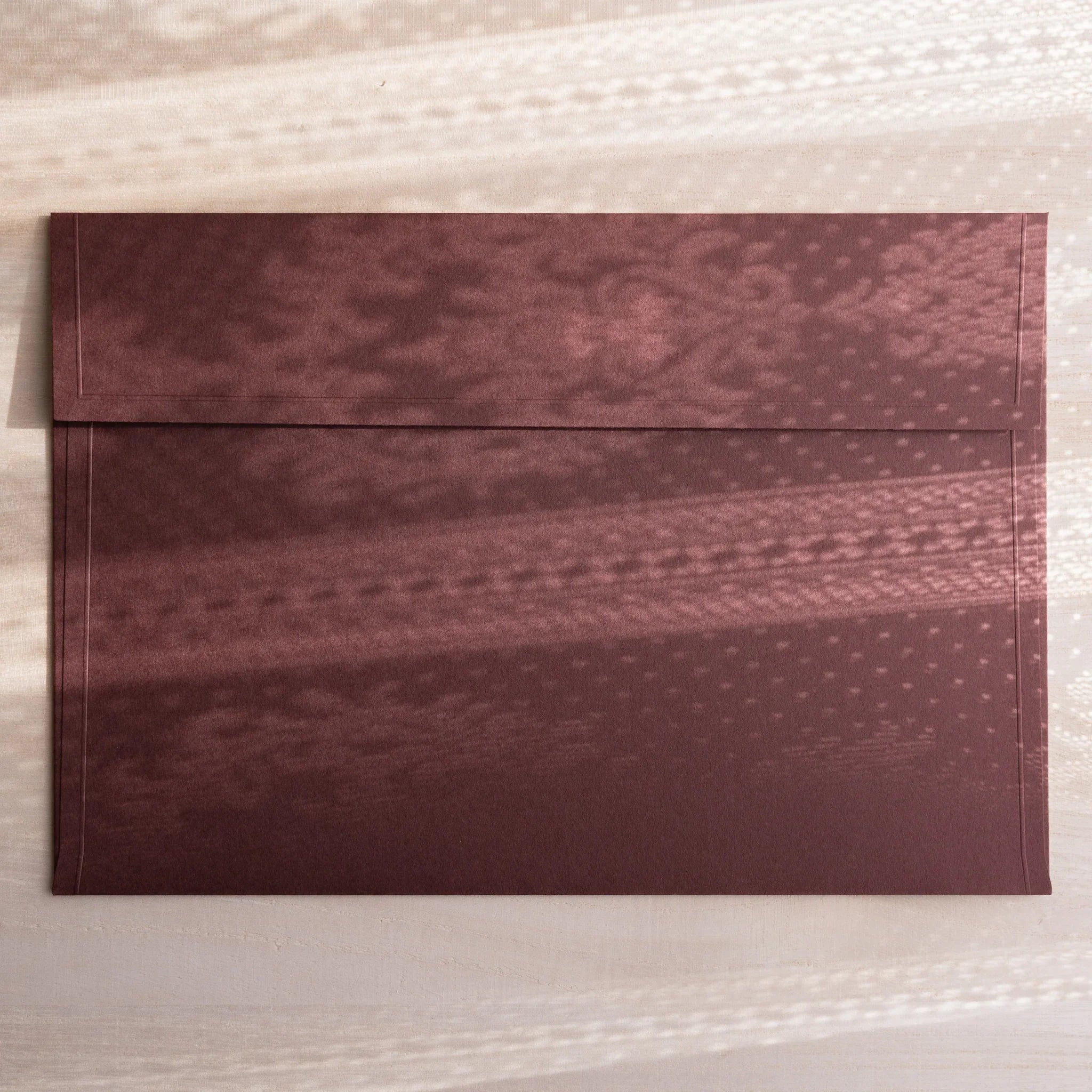 Dressco ivory large embossed envelope image sixty-nine, fanned display layout, with embossed paper, set of three