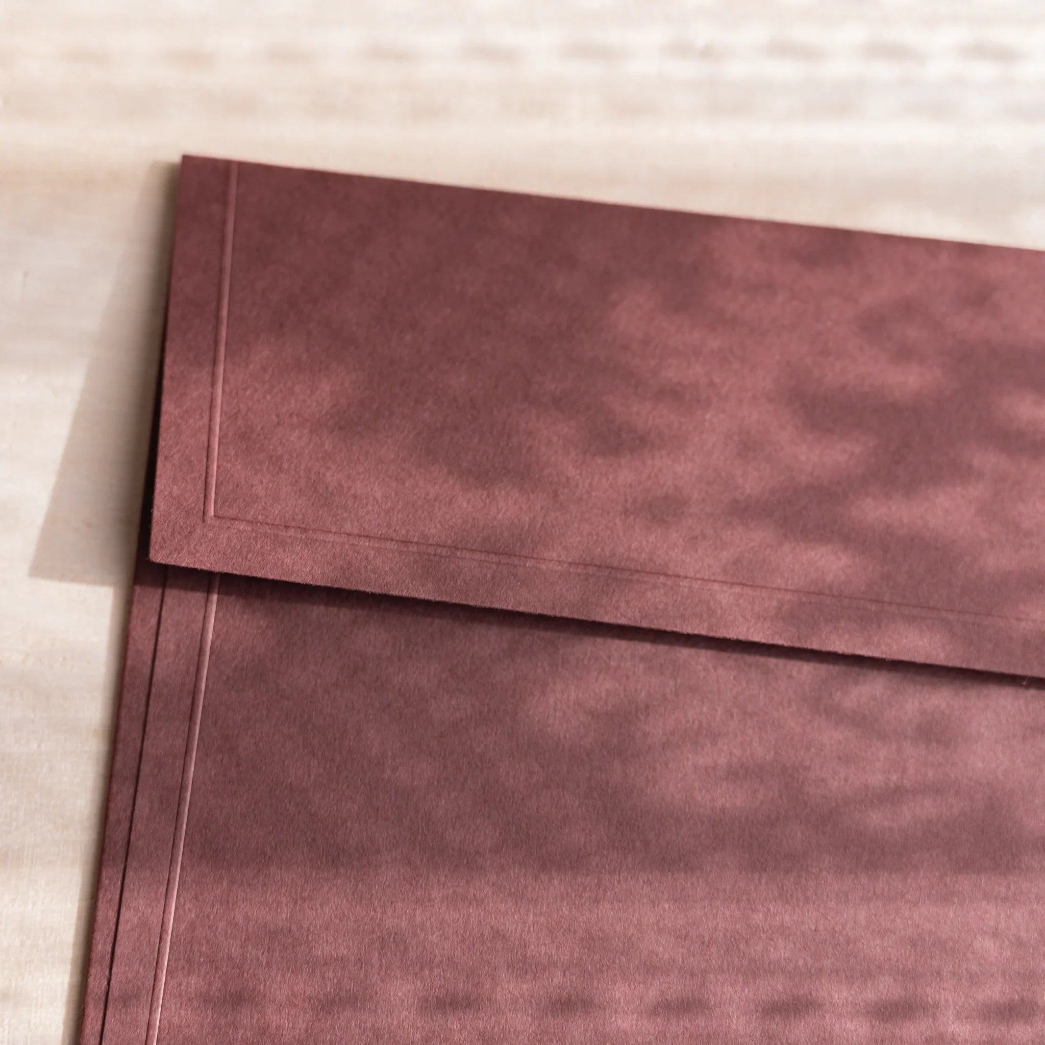 Dressco ivory large embossed envelope image seventy-one, front view showing sealed flap, with raised embossing, set of three