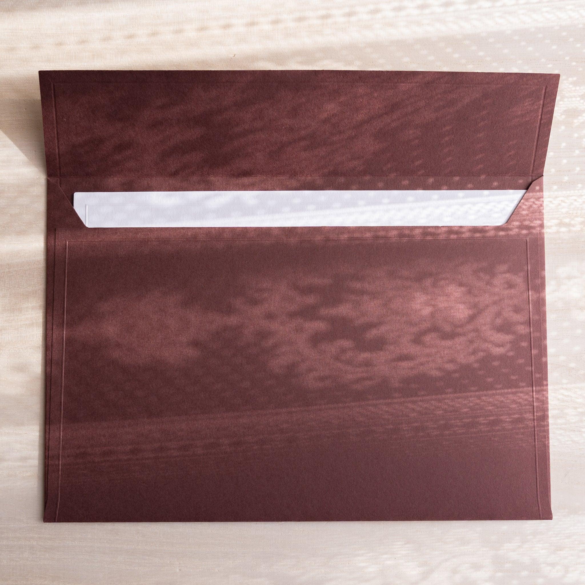 Dressco ivory large embossed envelope image seventy-four, right angled side view, with embossing detail, set of three