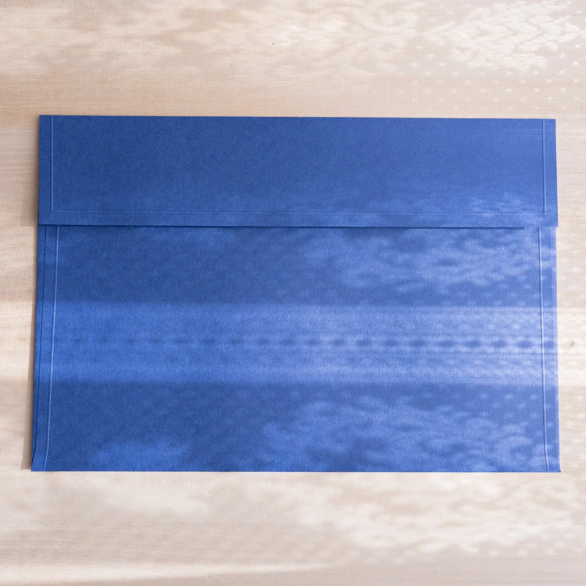 Dressco ivory large embossed envelope image ninety-three, left angled side view, with embossed finish, set of three