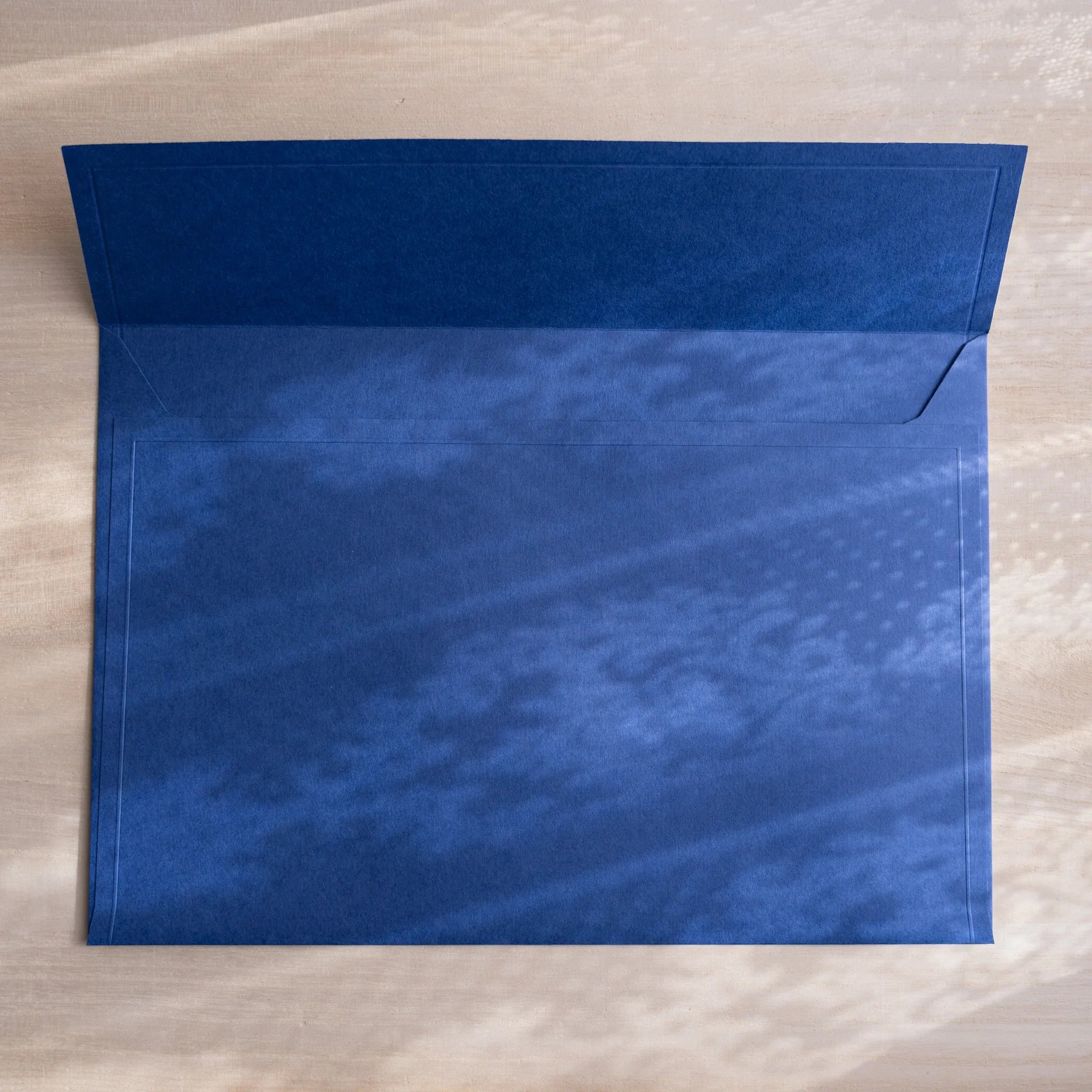 Dressco ivory large embossed envelope image ninety-four, right angled side view, with embossing detail, set of three