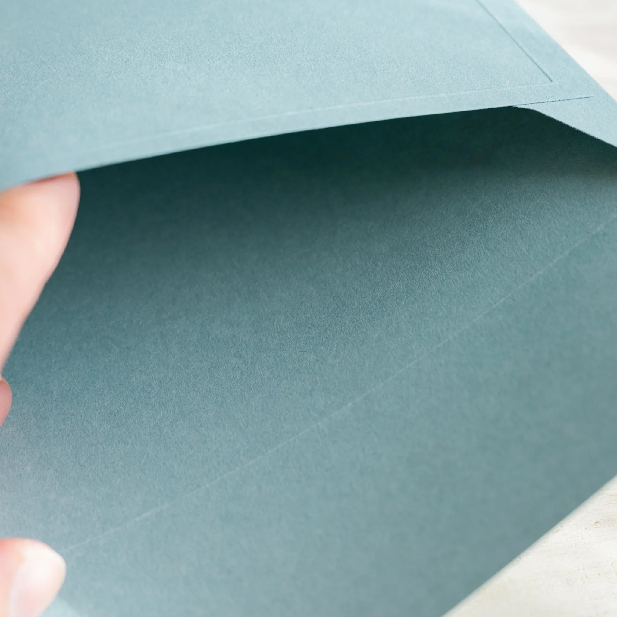 Dressco ivory large embossed envelope image nine, fanned display layout, with embossed paper, set of three quality