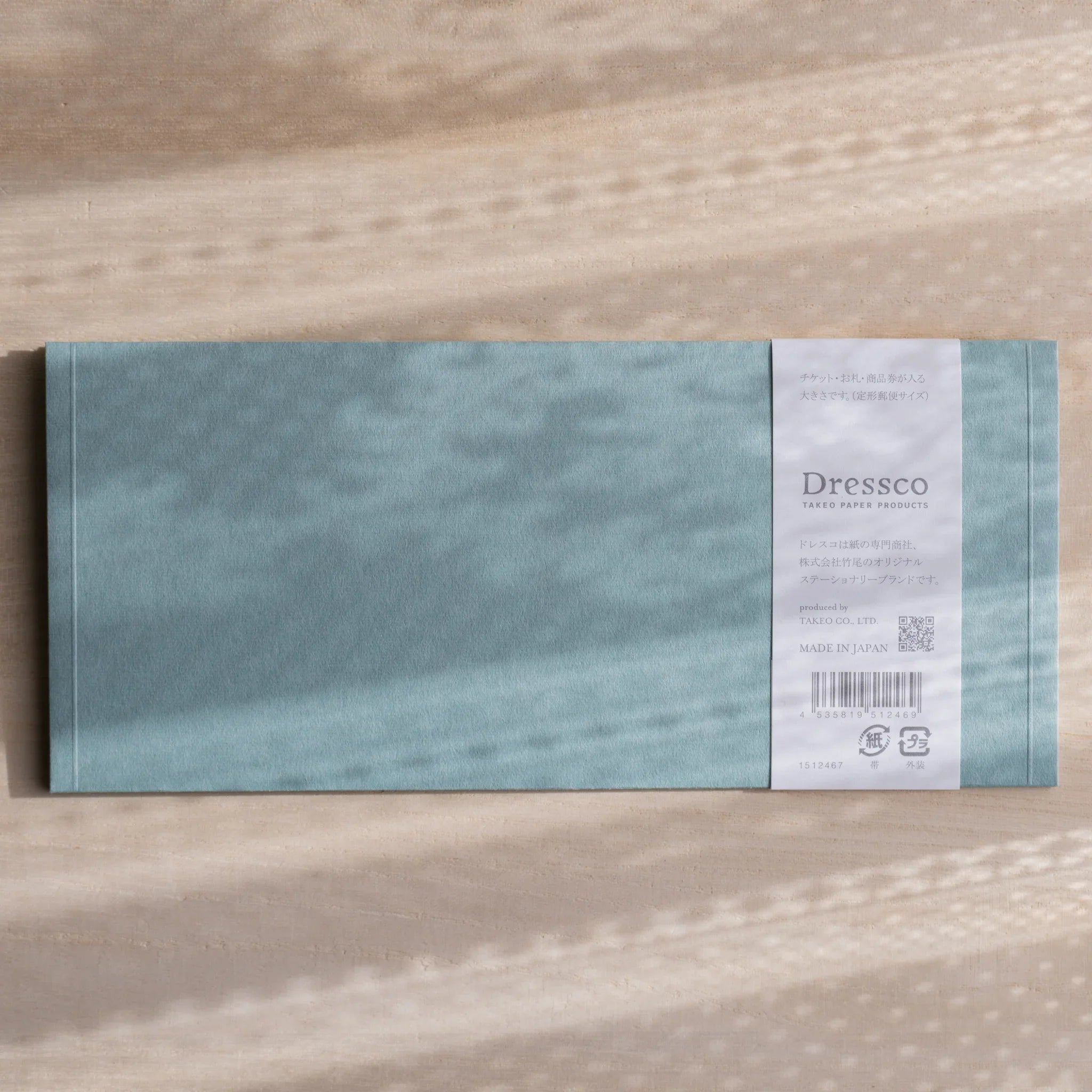 Dressco ivory medium embossed envelope image thirteen, left angled side view, with embossed finish, set of three