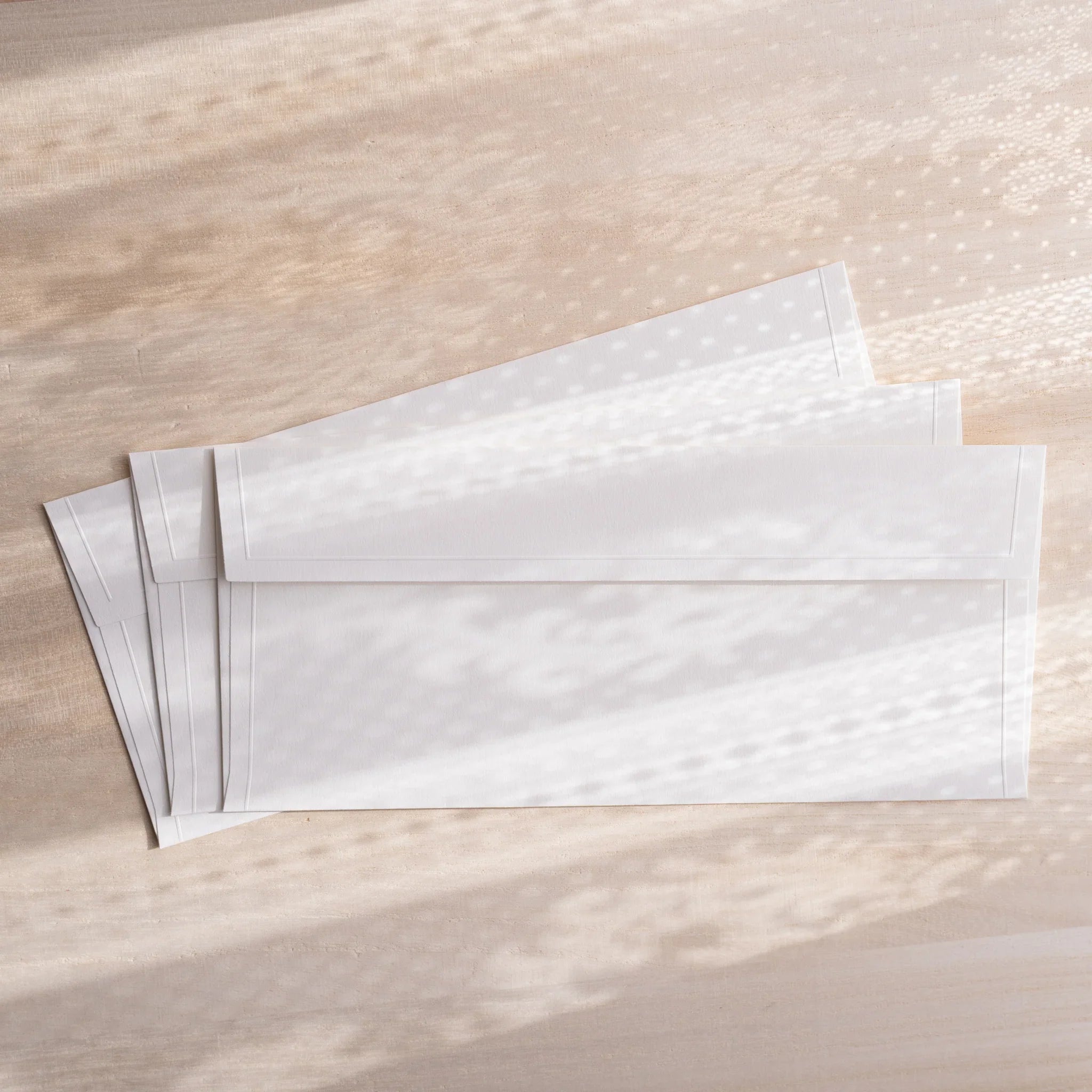 Dressco ivory medium embossed envelope image seventeen, envelope edge detail, with embossed texture, set of three