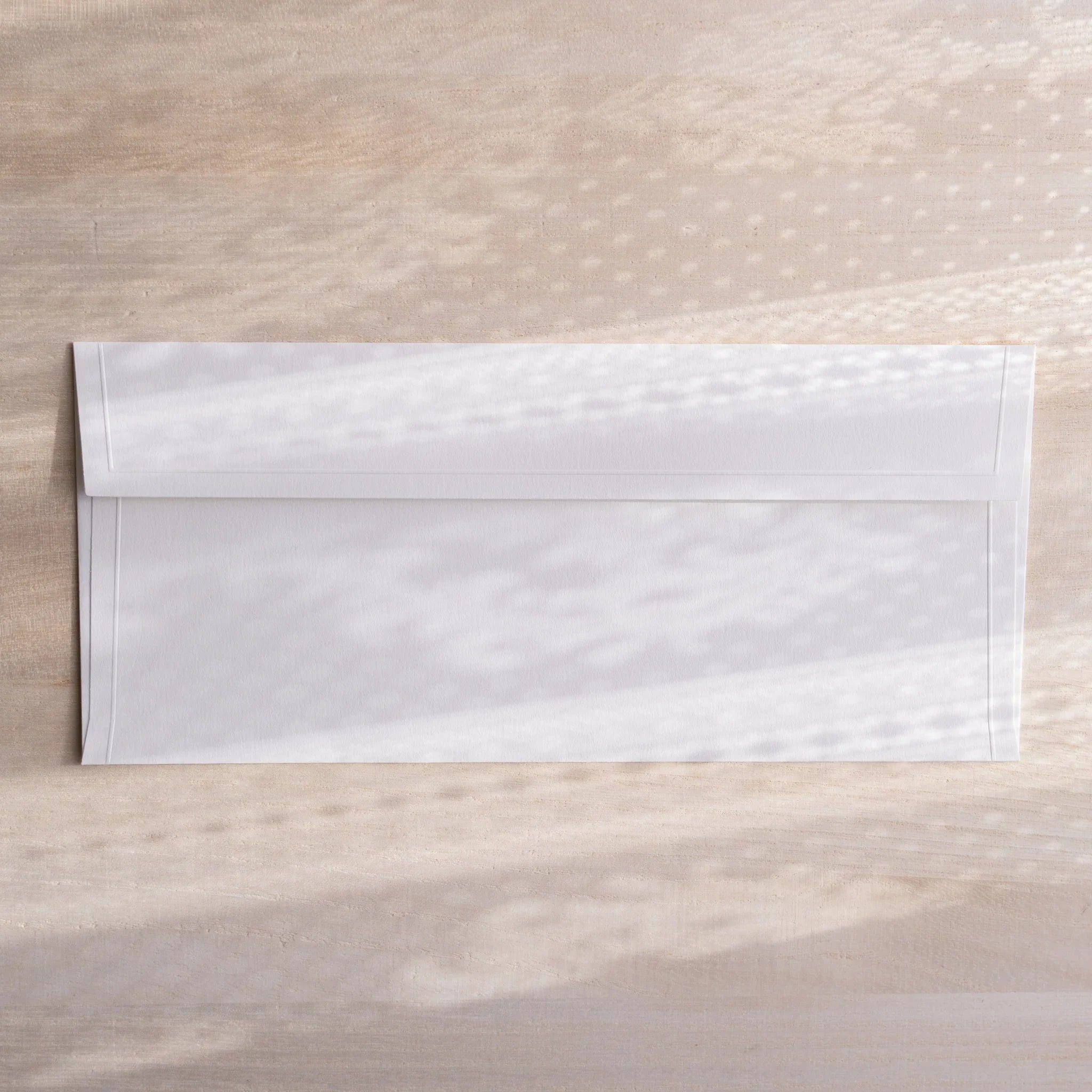 Dressco ivory medium embossed envelope image eighteen, corner detail view, with embossing design, set of three