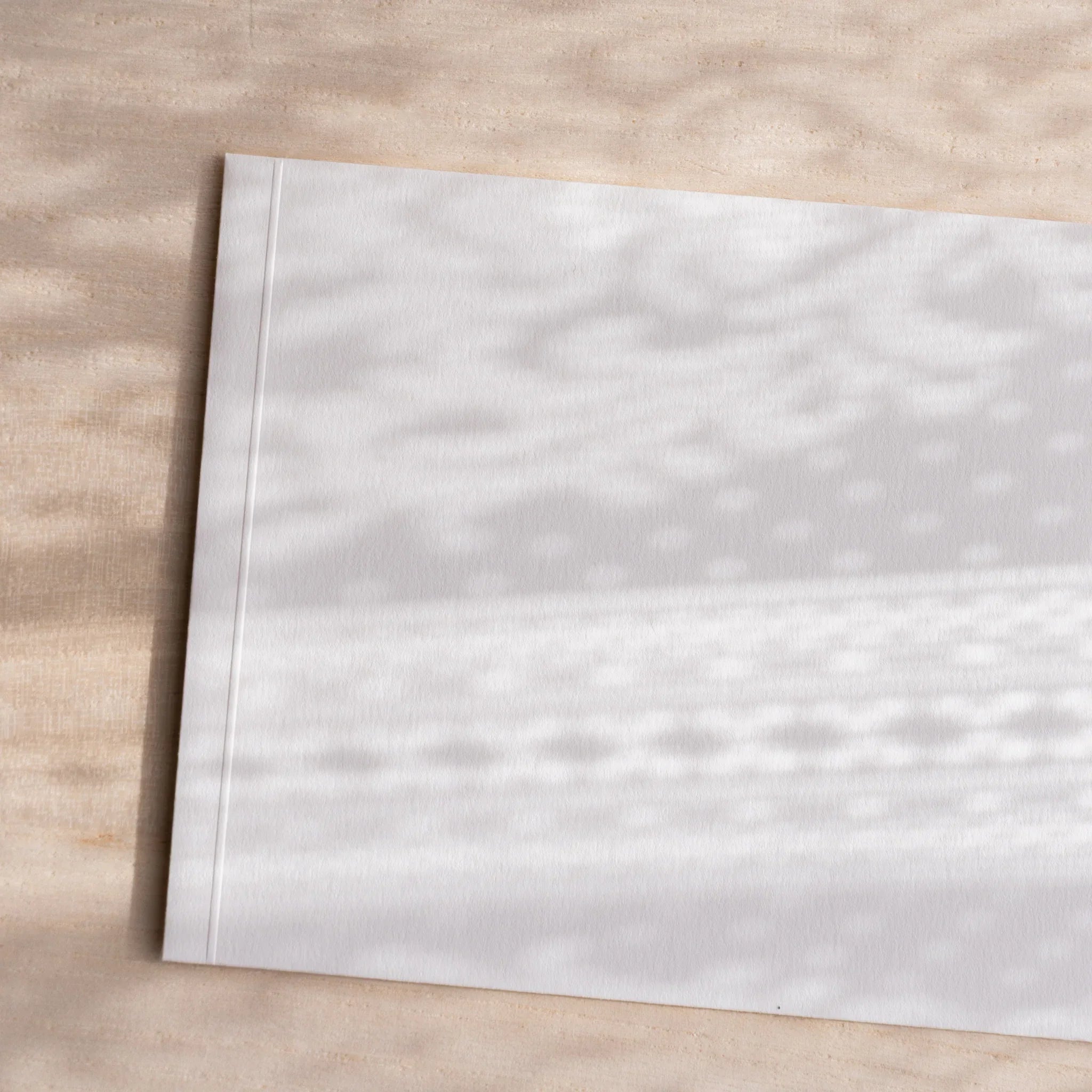 Dressco ivory medium embossed envelope image twenty-four, right angled side view, with embossing detail, set of three