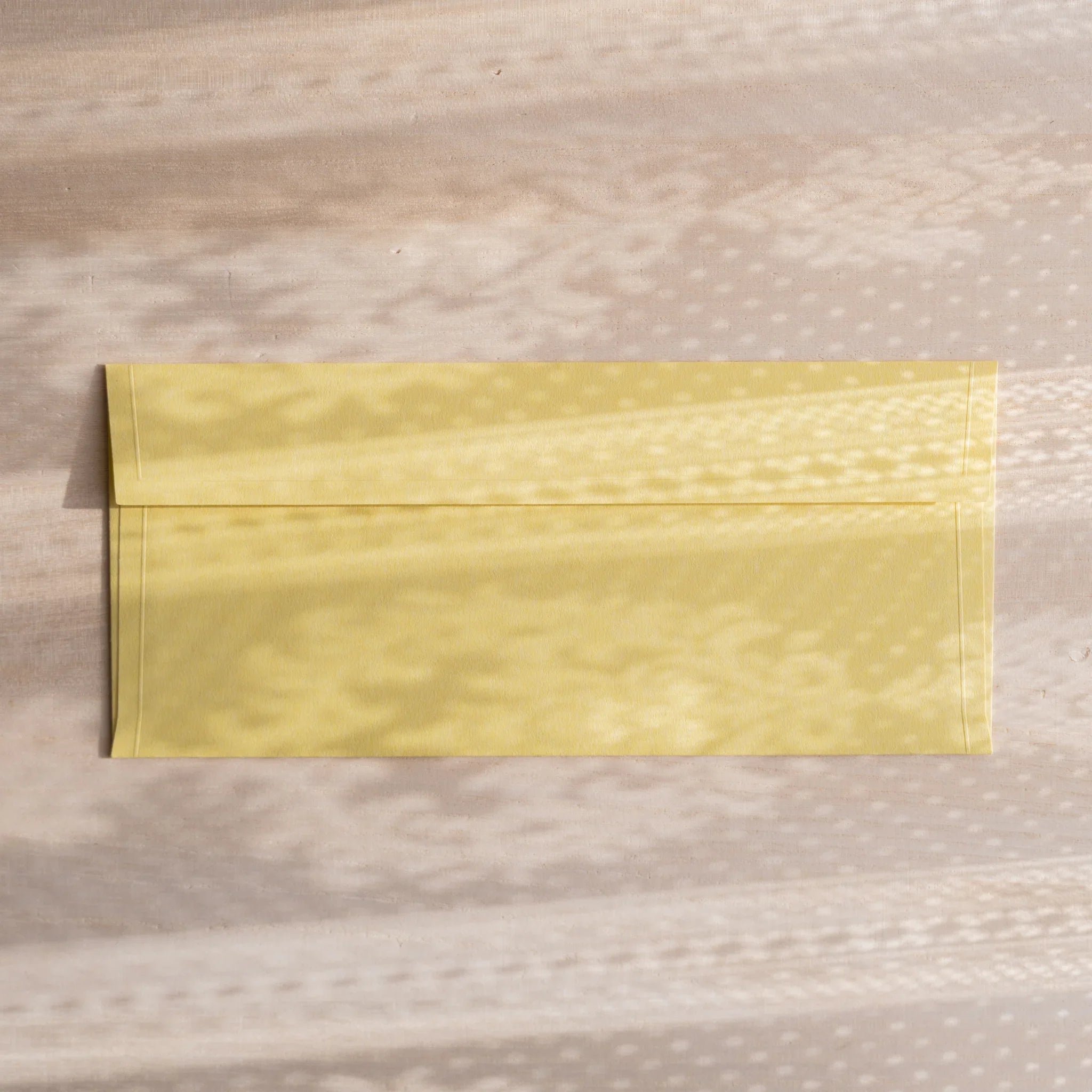 Dressco ivory medium embossed envelope image twenty-eight, corner detail view, with embossing design, set of three