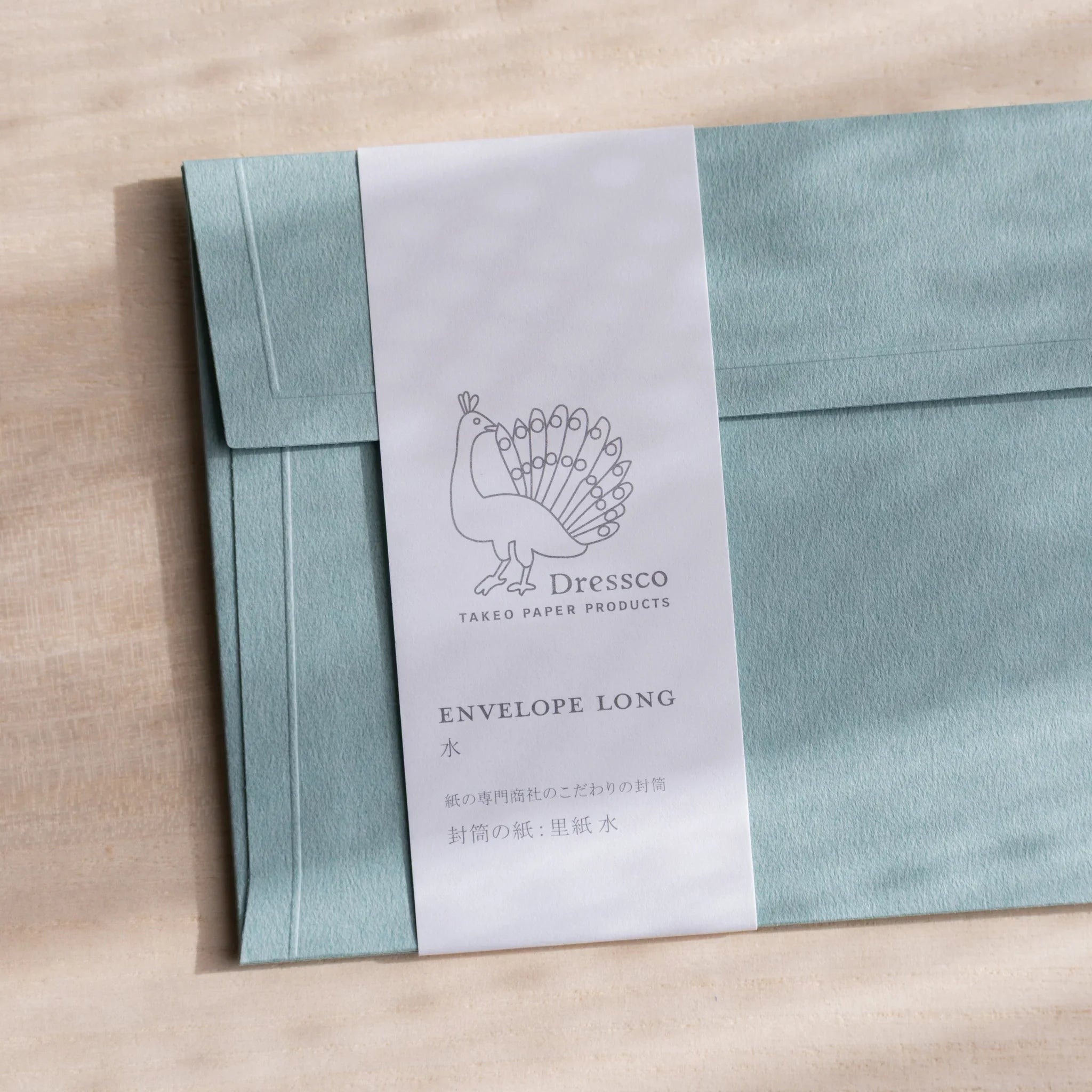 Dressco ivory medium embossed envelope image three, left angled side view, with embossed finish, set of three quality