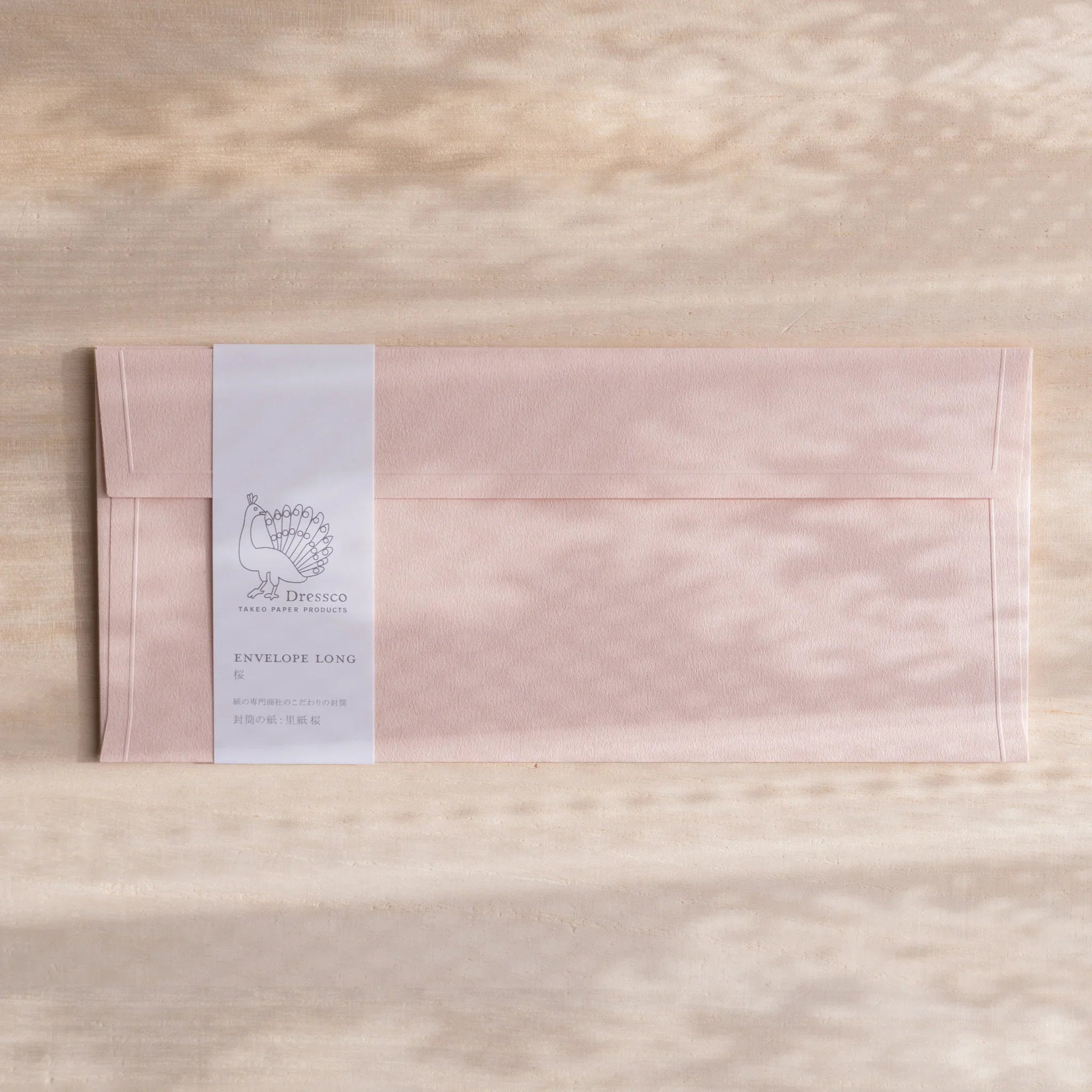 Dressco ivory medium embossed envelope image thirty-five, overhead flat composition, with embossed surface, set of three