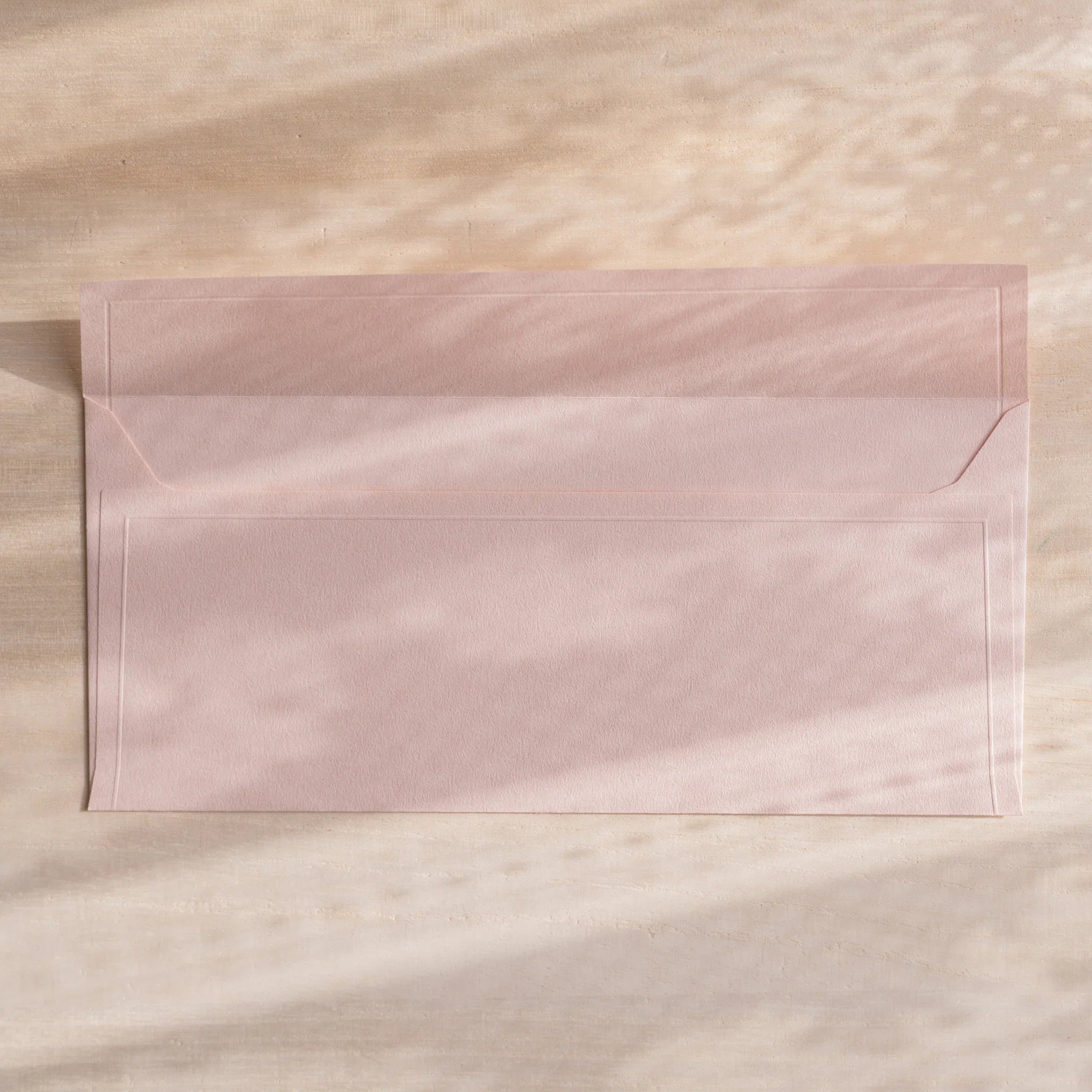 Dressco ivory medium embossed envelope image thirty-eight, corner detail view, with embossing design, set of three