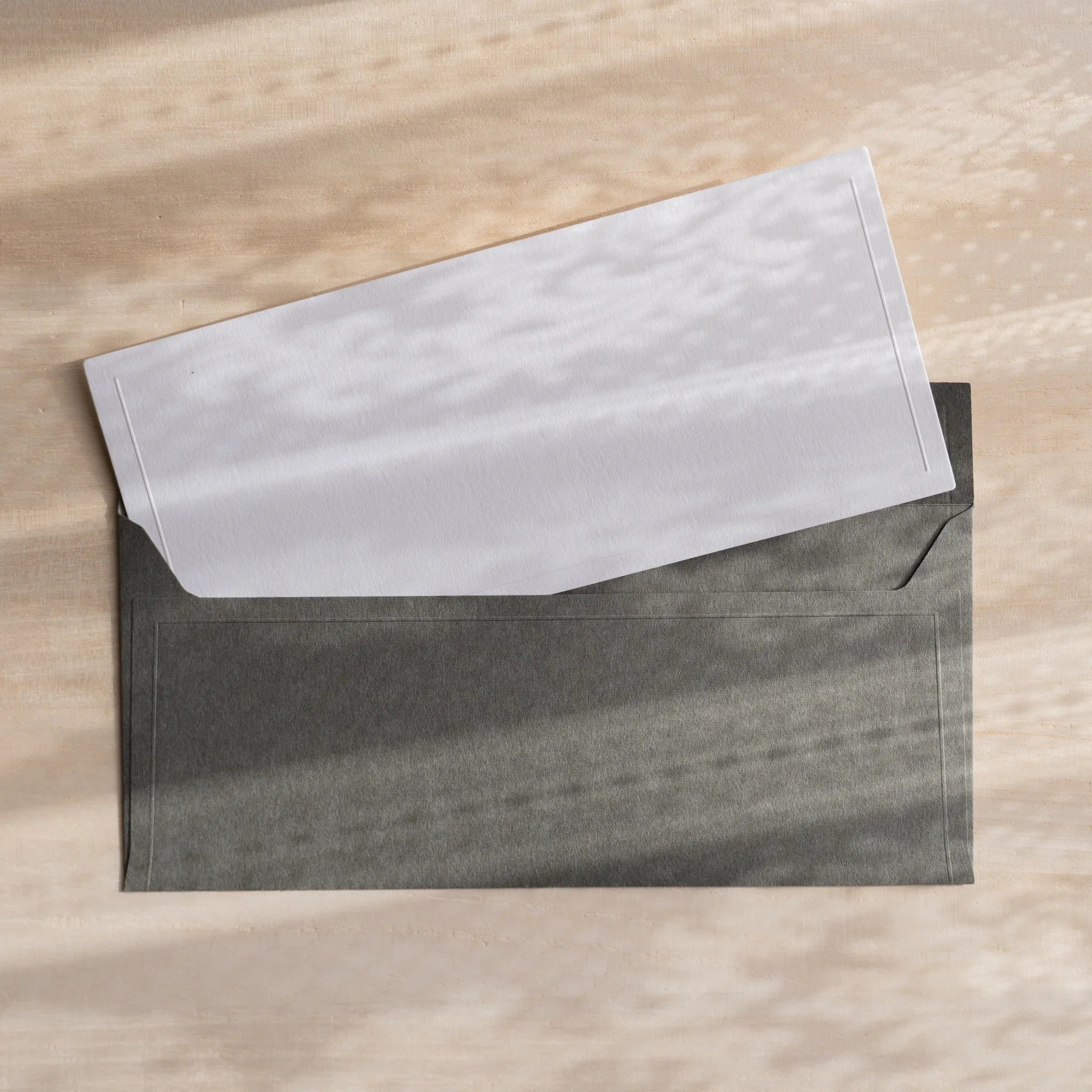 Dressco ivory medium embossed envelope image forty-eight, corner detail view, with embossing design, set of three