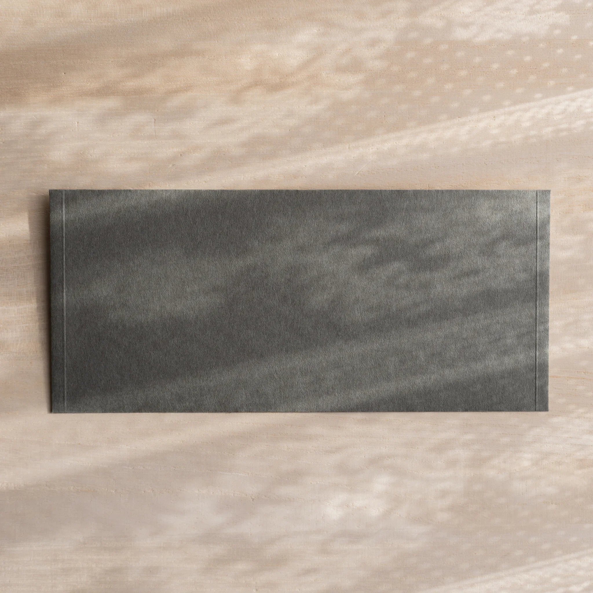 Dressco ivory medium embossed envelope image fifty, stacked arrangement view, with embossing elegance, set of three