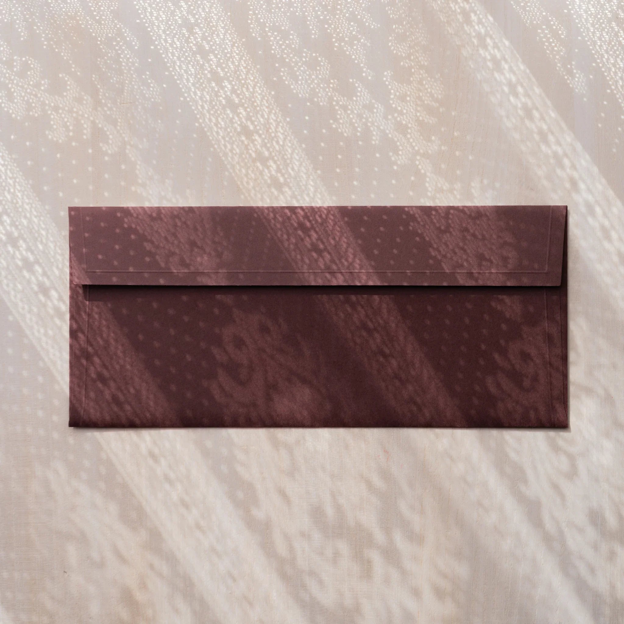 Dressco ivory medium embossed envelope image fifty-four, right angled side view, with embossing detail, set of three