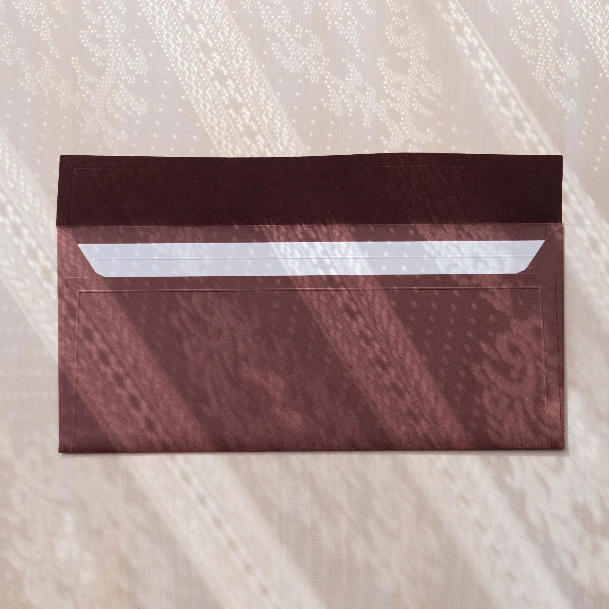 Dressco ivory medium embossed envelope image fifty-nine, fanned display layout, with embossed paper, set of three