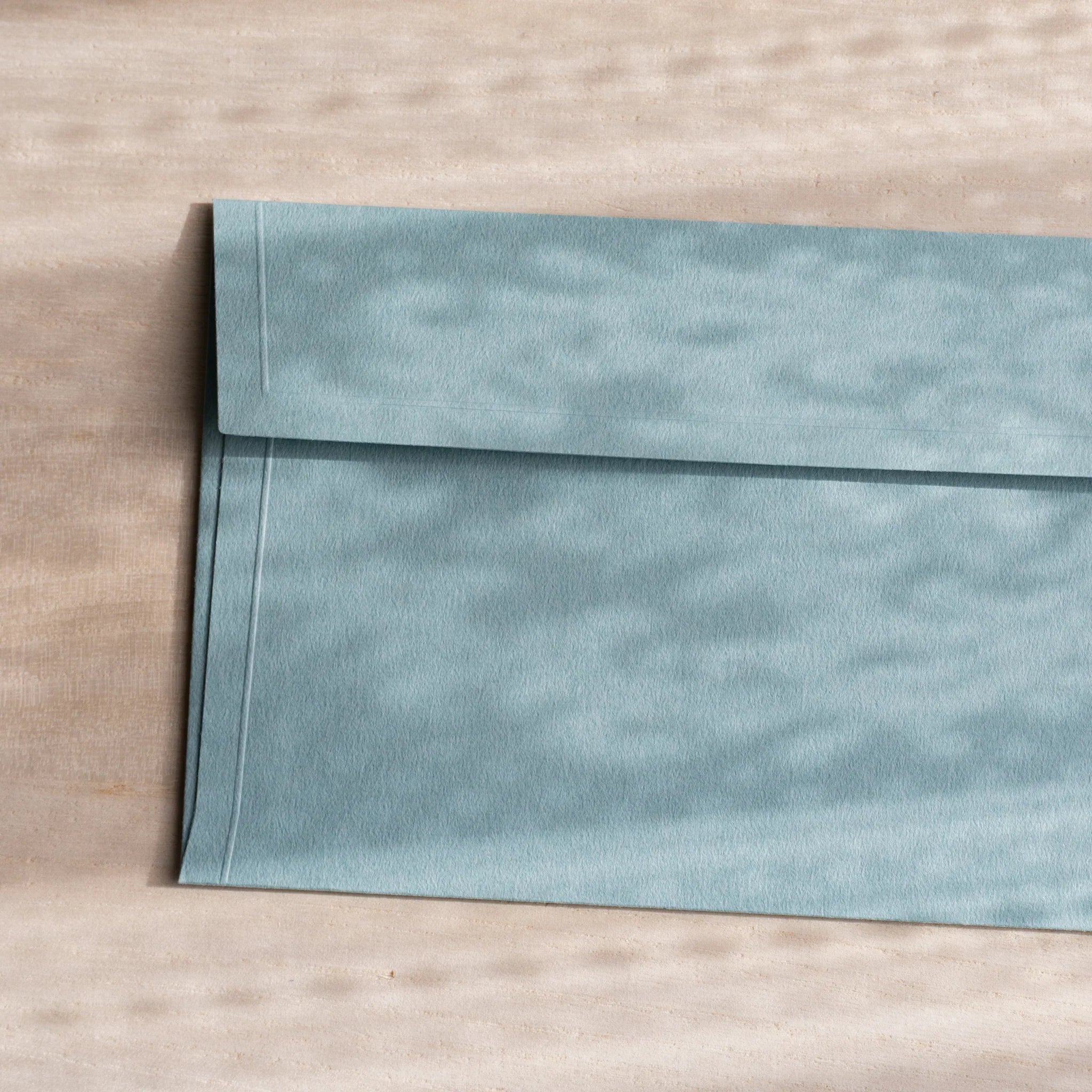 Dressco ivory medium embossed envelope image six, close-up texture detail, with embossing quality, set of three