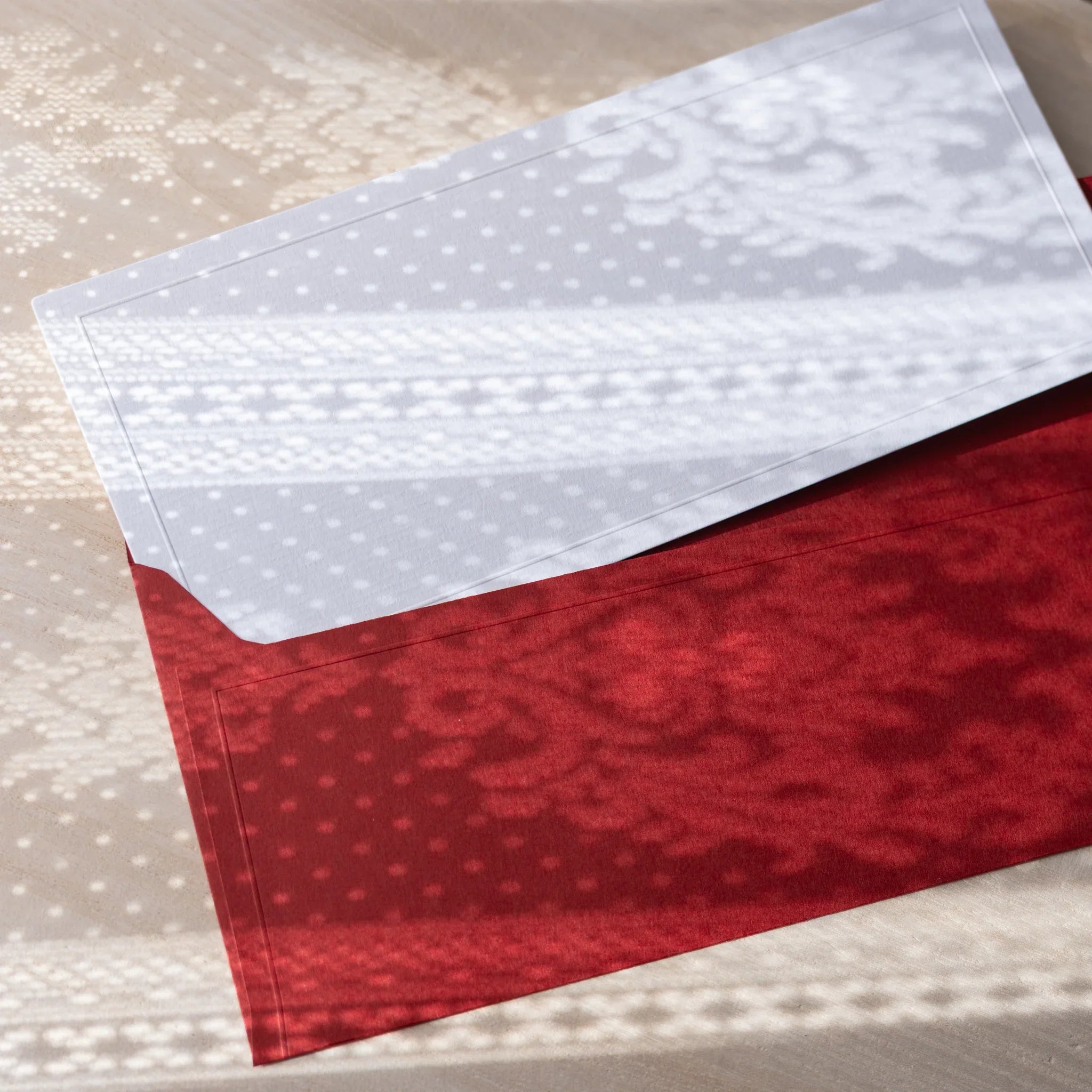 Dressco ivory medium embossed envelope image sixty-eight, corner detail view, with embossing design, set of three