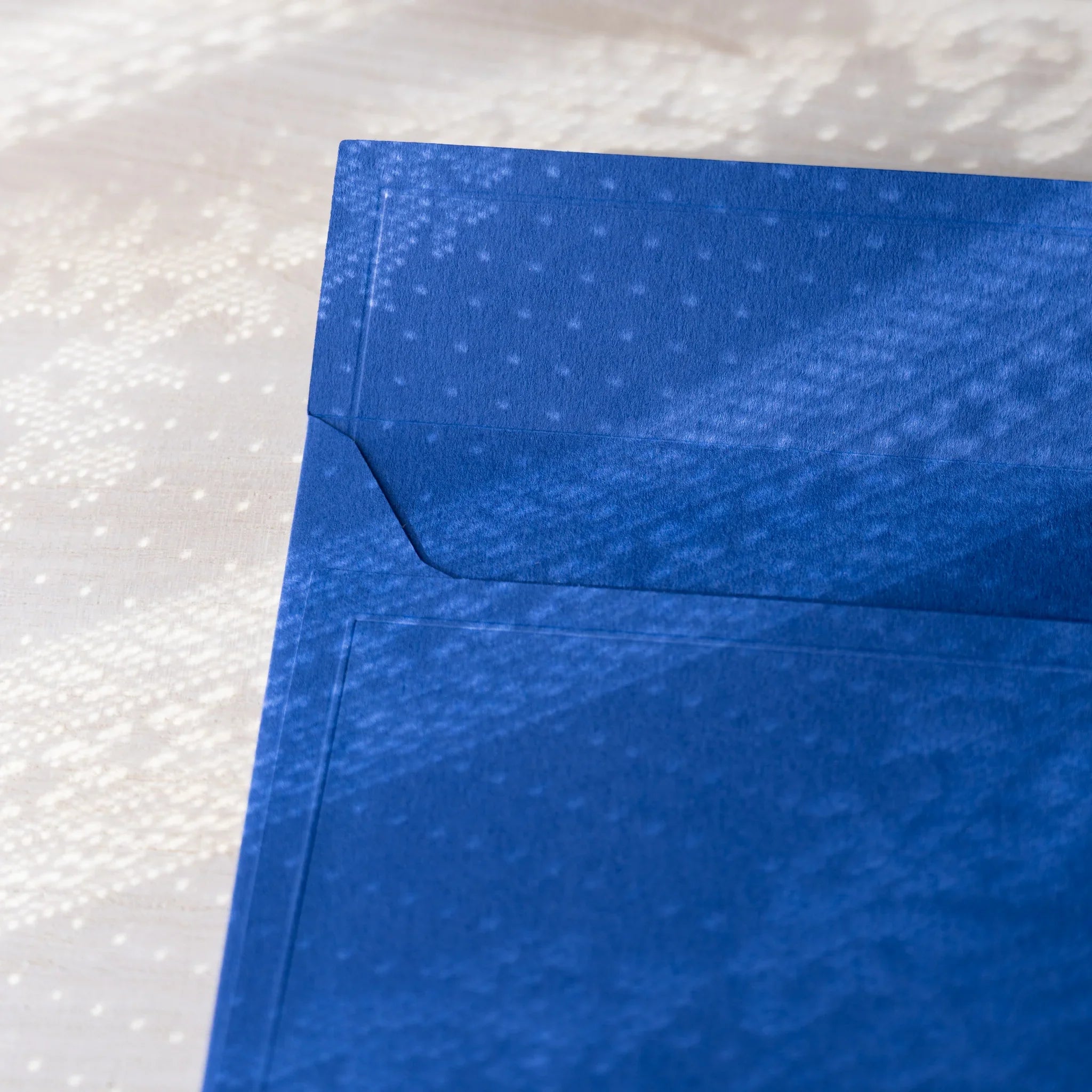 Dressco ivory medium embossed envelope image seventy-eight, corner detail view, with embossing design, set of three