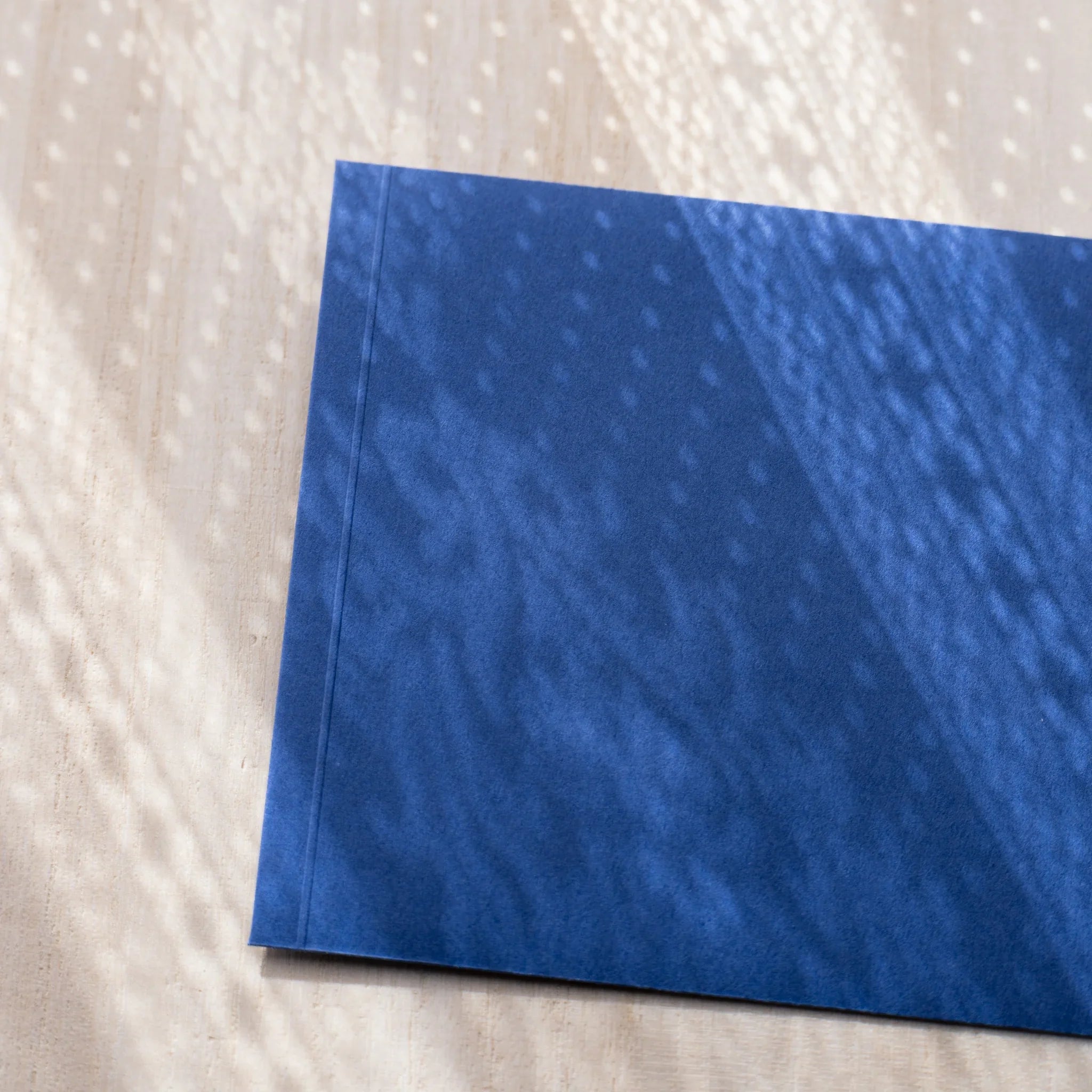 Dressco ivory medium embossed envelope image eighty-two, back view showing flap closure, with embossed pattern, set of three