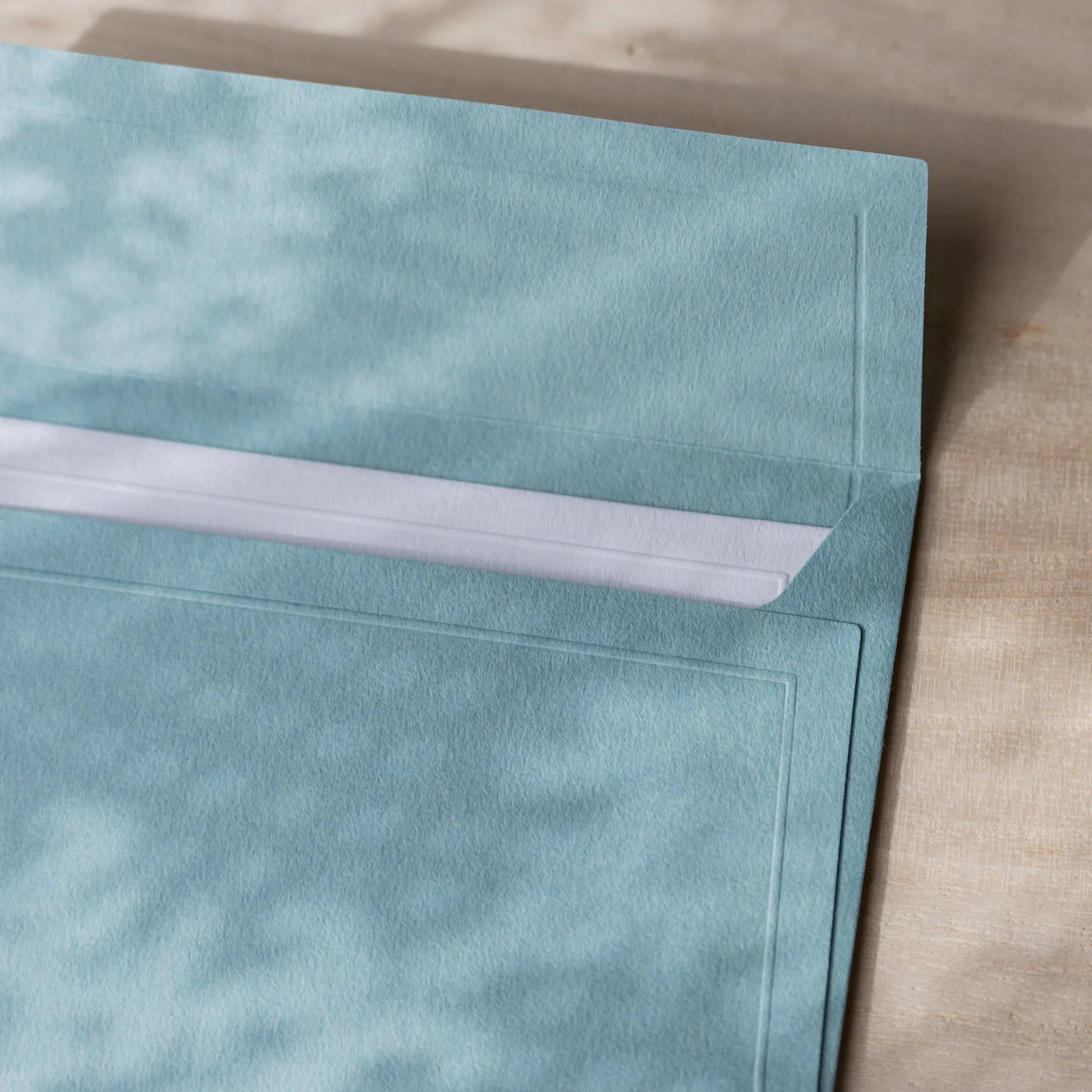 Dressco embossed small envelope in yellow, close-up detail sealed flap