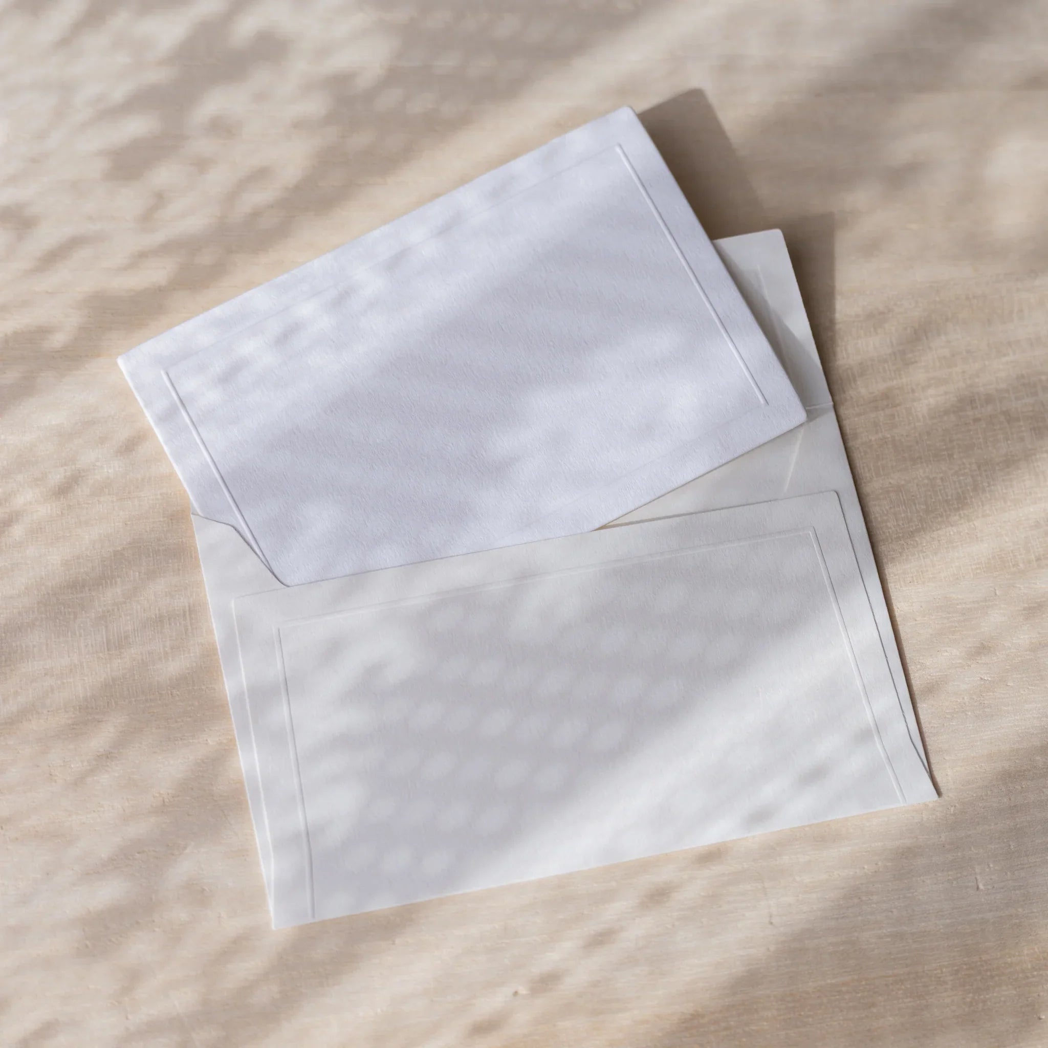 Dressco embossed small envelope in soft toned, isolated view decorative detail