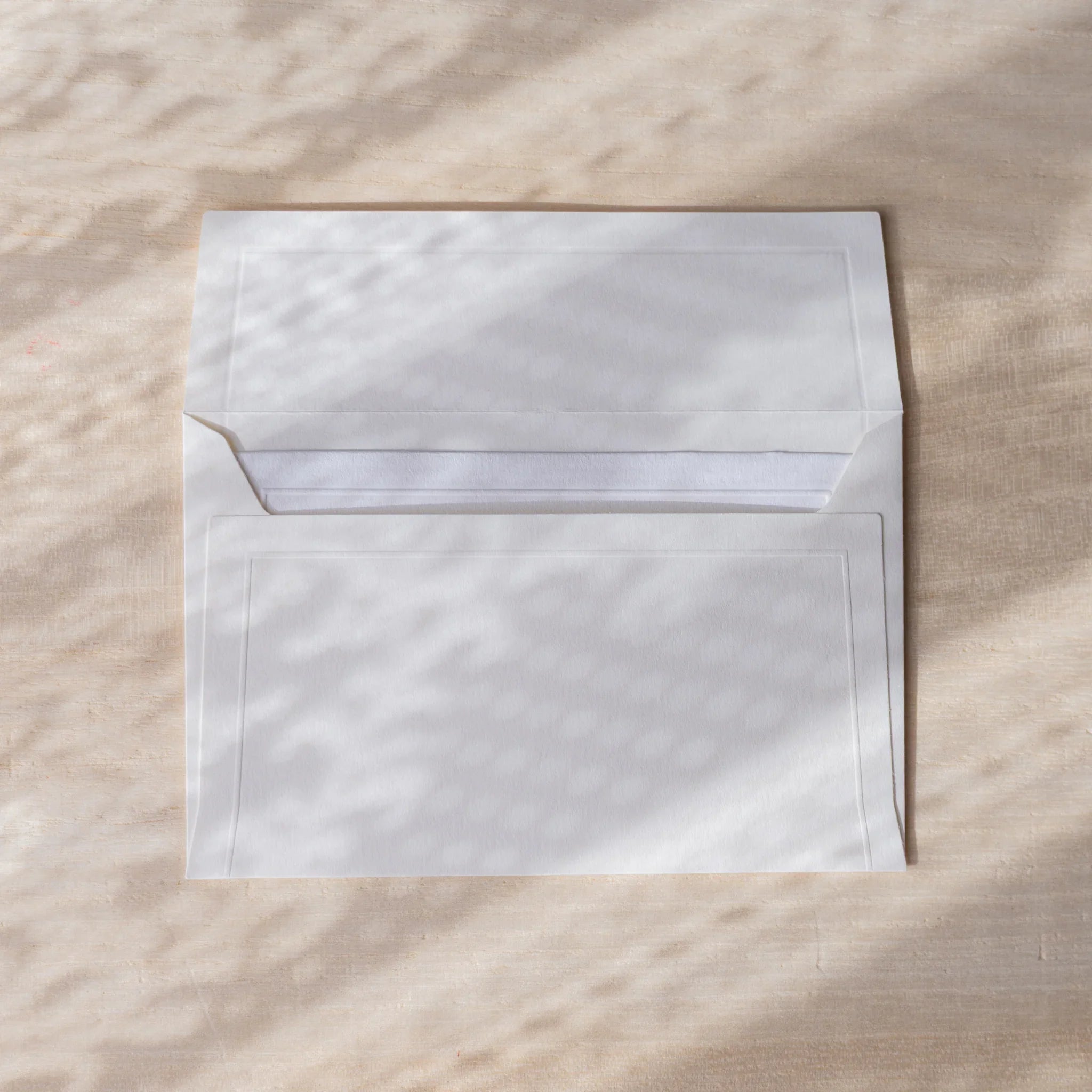 Dressco envelope collection featuring sage green, isolated view highlighting dec