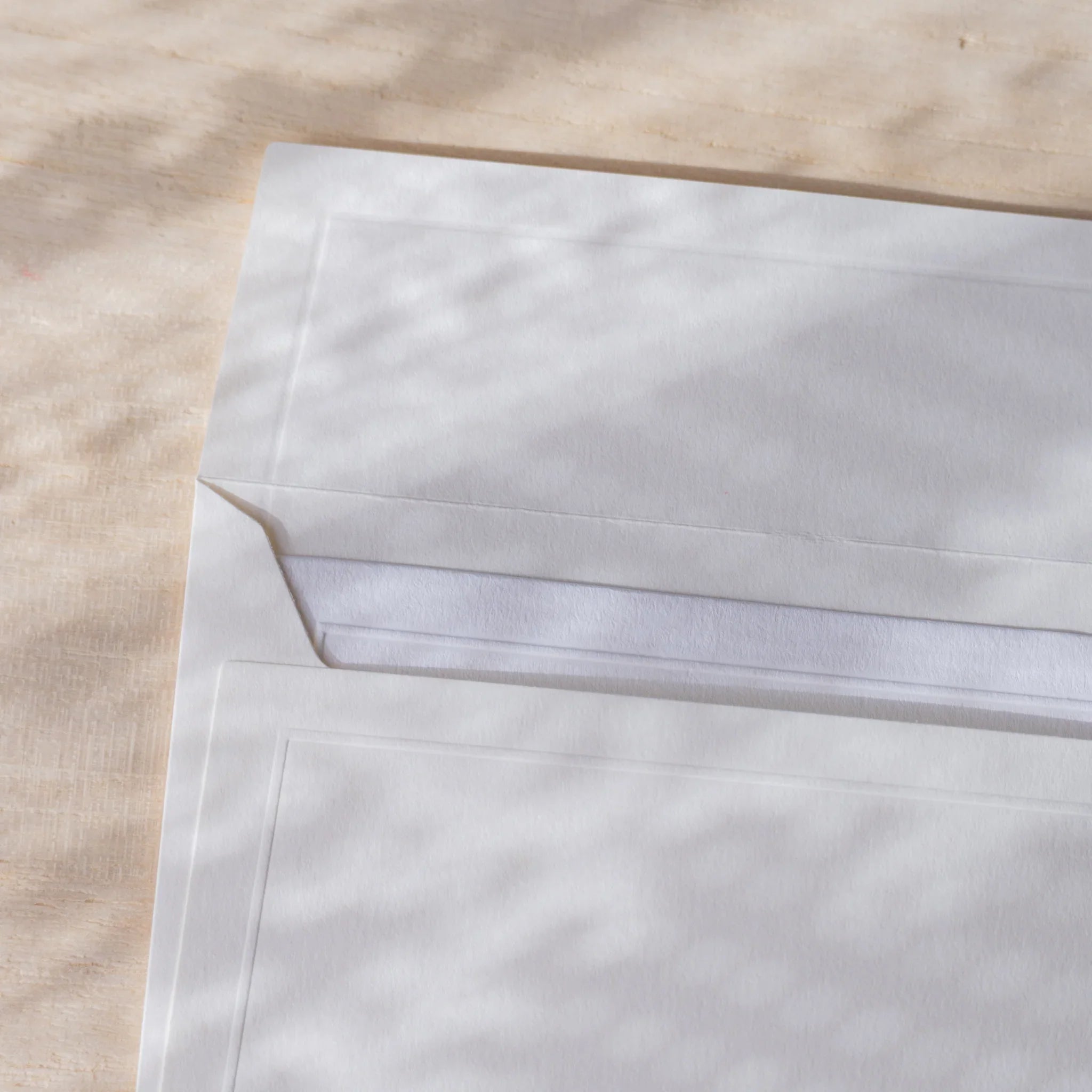 Dressco embossed small envelope in teal, angled display decorative detail