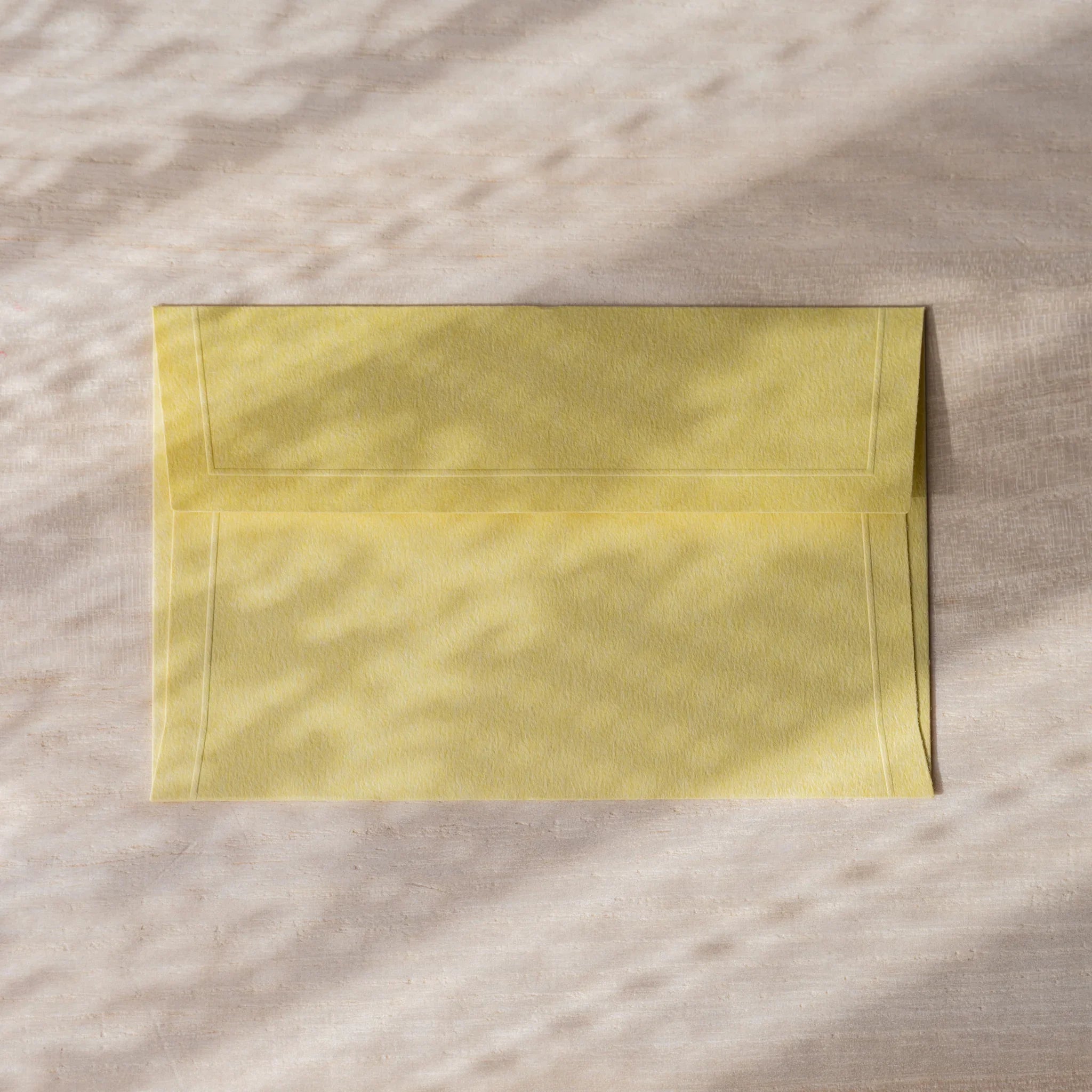 Dressco embossed small envelope in multicolor, arranged display raised design