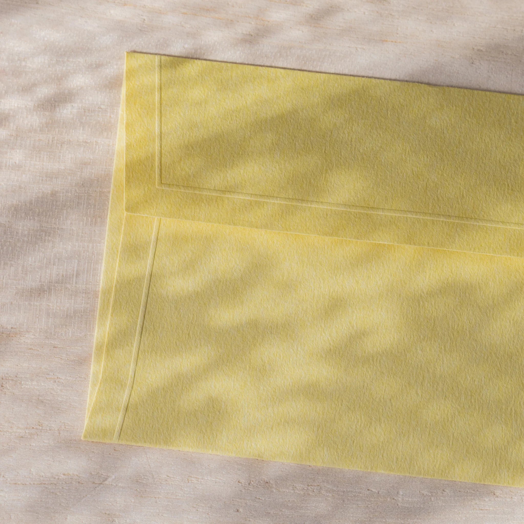 Dressco small embossed envelope set, white shade, arranged display with raised d