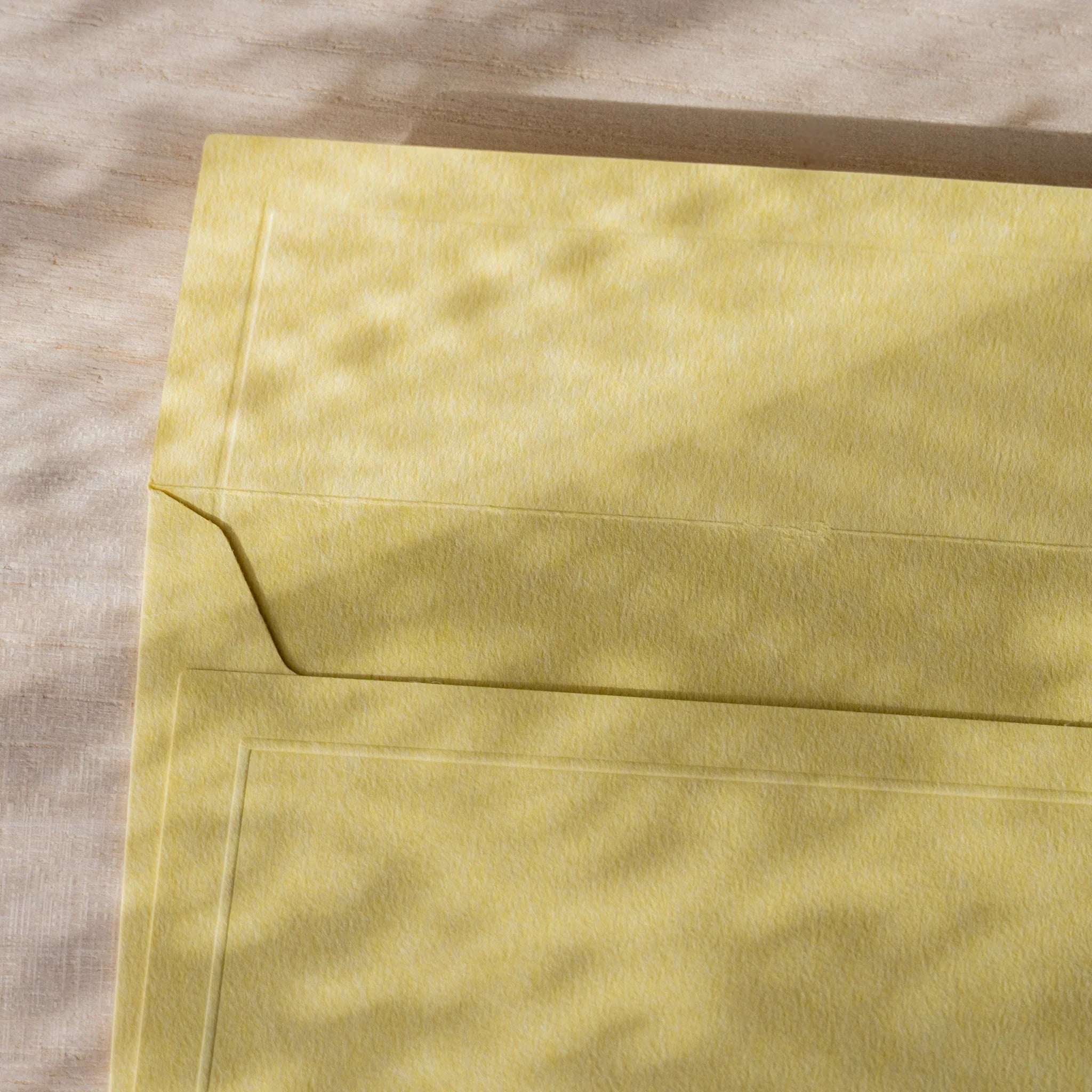 Dressco envelope collection featuring teal, product shot showing highlighting se