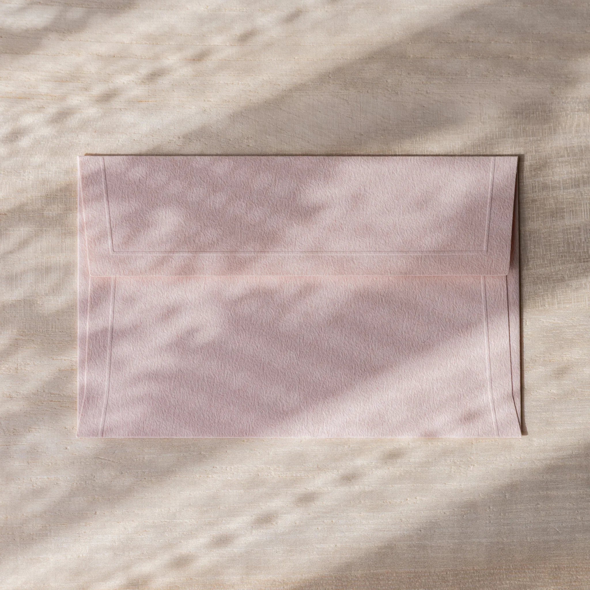 Dressco envelope collection featuring sage green, isolated view highlighting emb