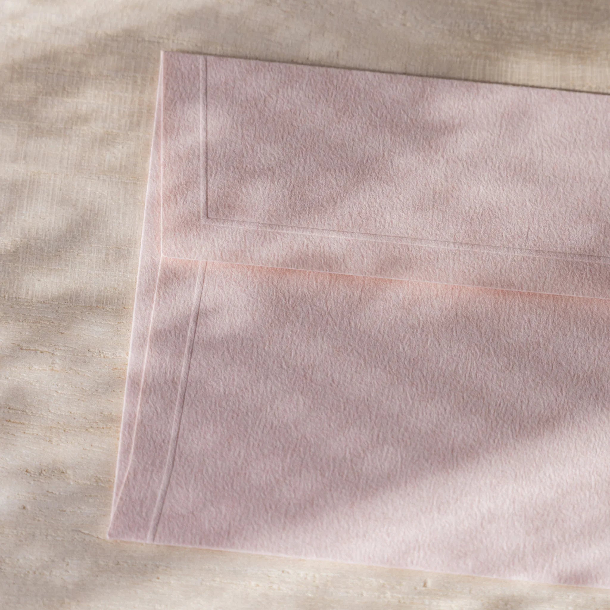 Dressco small embossed envelope set, yellow shade, fanned arrangement with subt