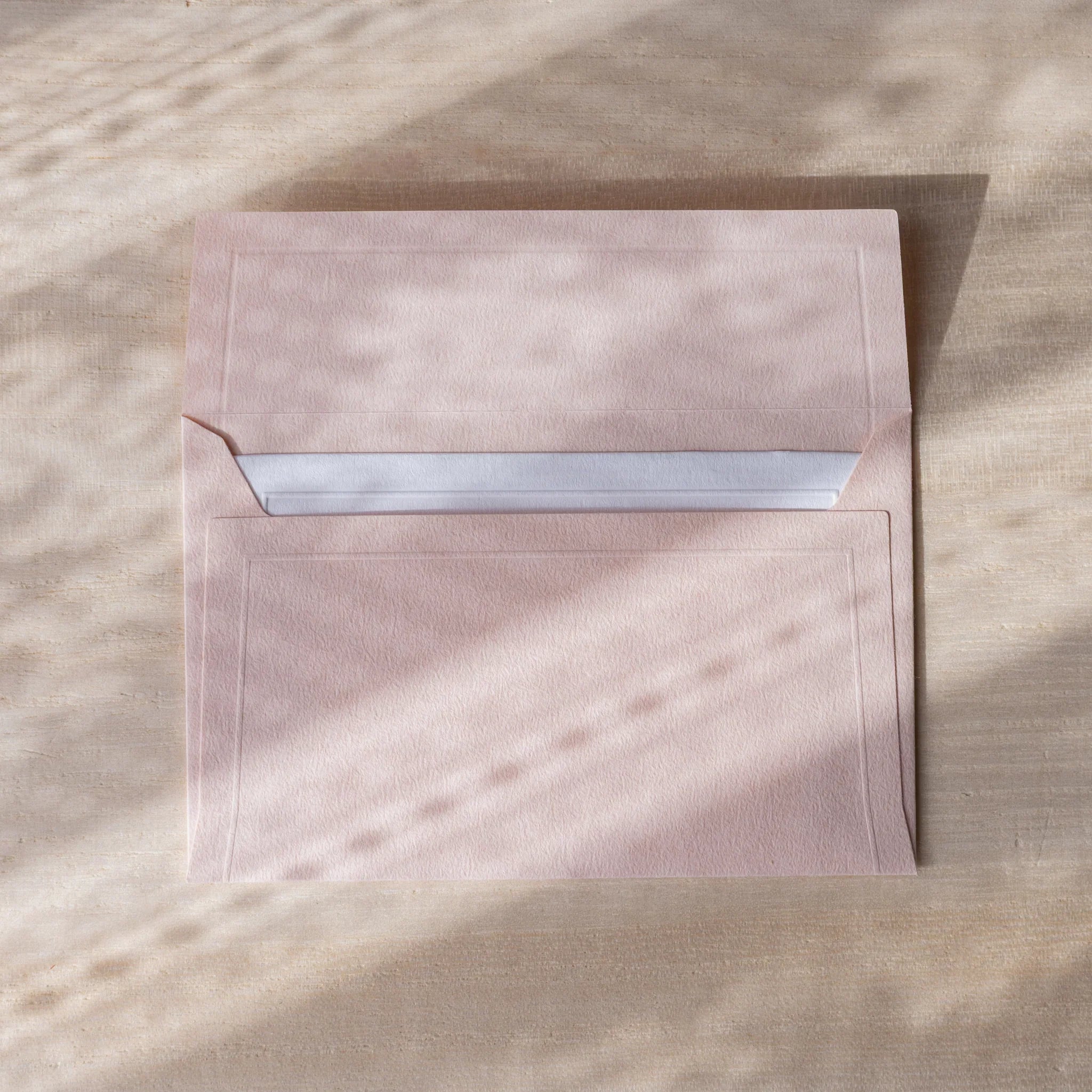 Dressco envelope collection featuring multiple colored, fanned arrangement