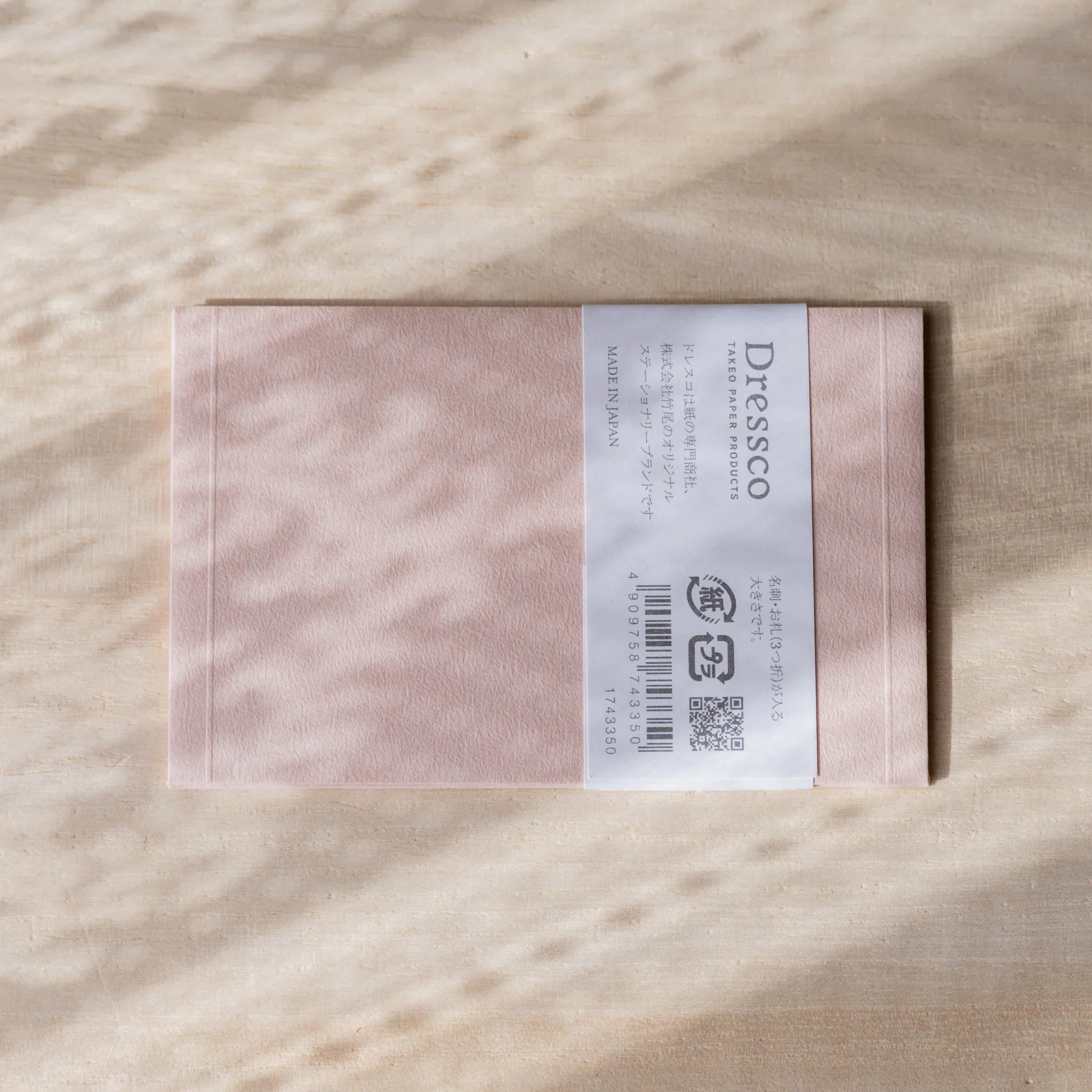 Dressco embossed envelope, yellow shade, product view displaying raised pattern