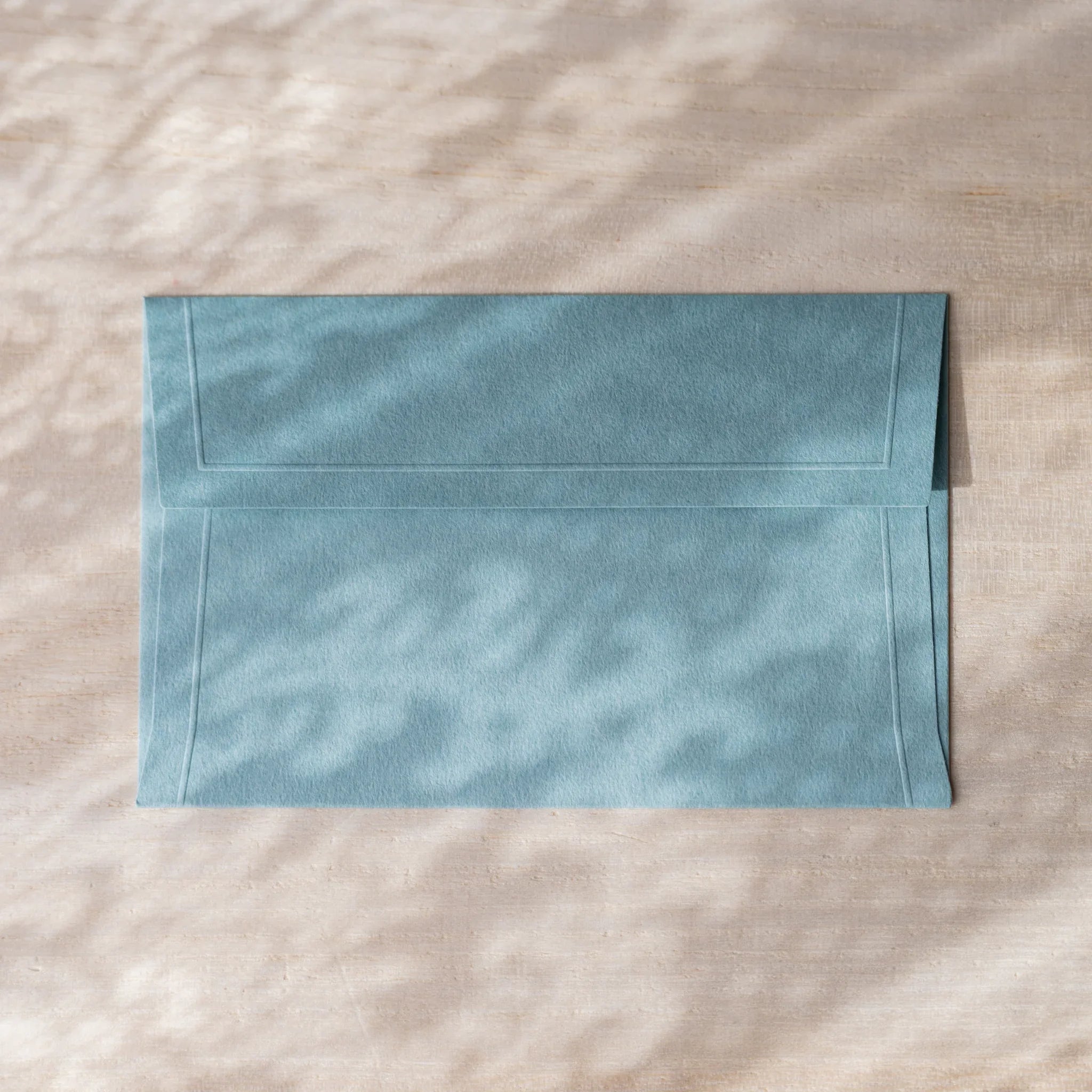 Dressco embossed small envelope in soft toned, isolated view embossed pattern