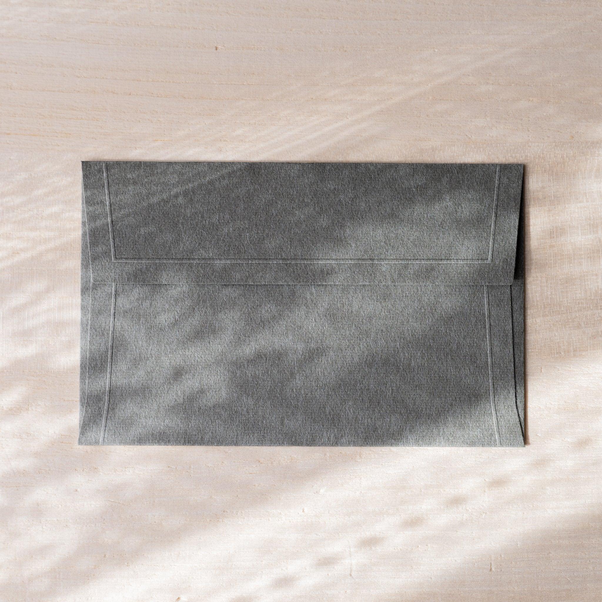 Dressco envelope set, pastel shade, isolated view showing embossed composition