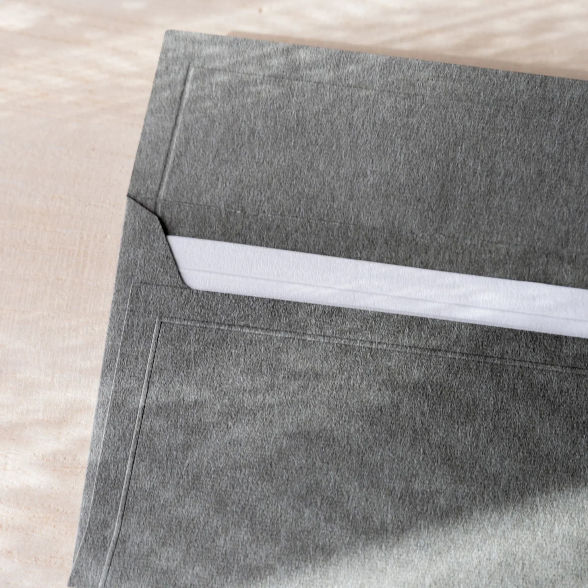 Dressco envelope, soft toned shade, flat lay displaying raised surface pattern