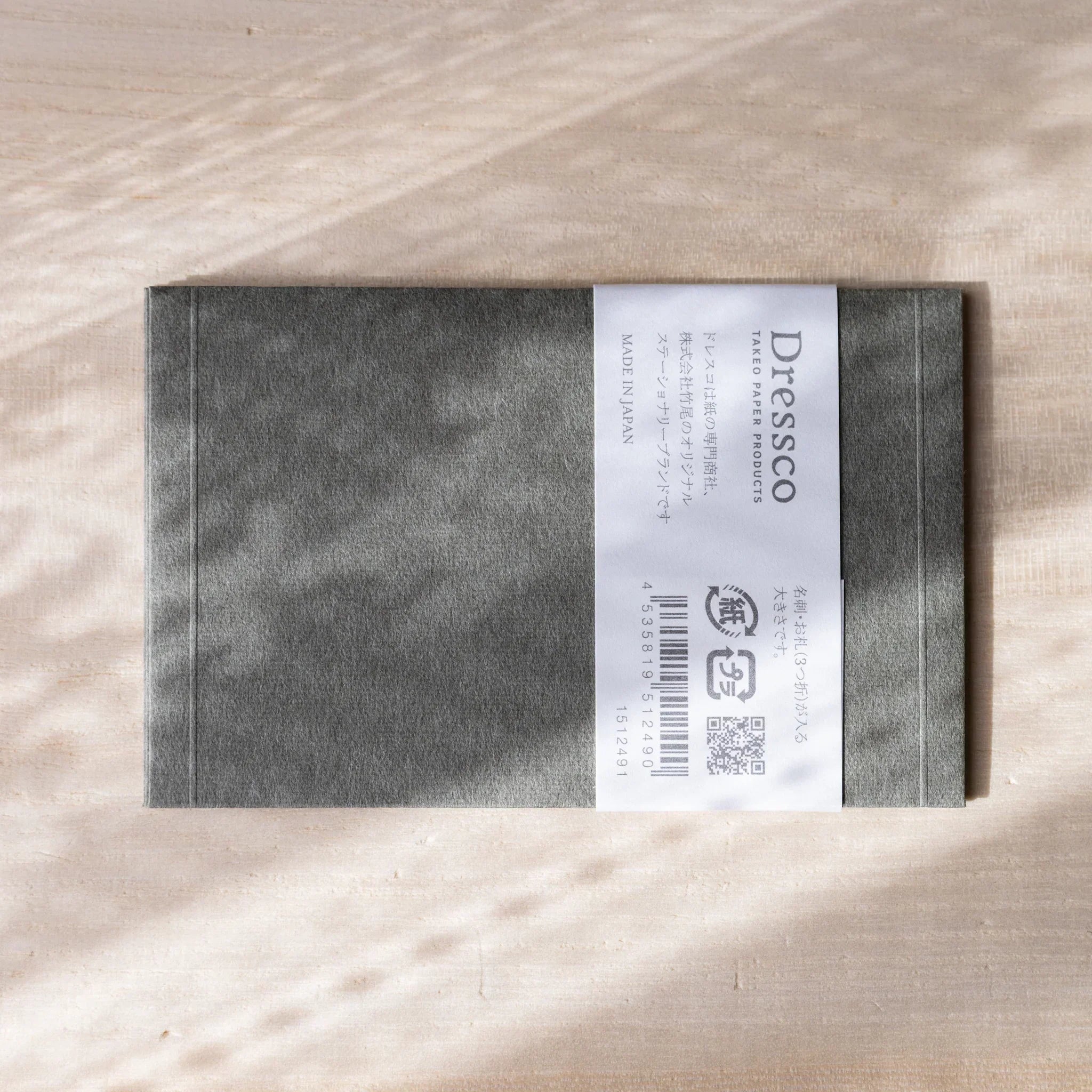 Dressco small envelope, teal, product shot highlighting embossed texture