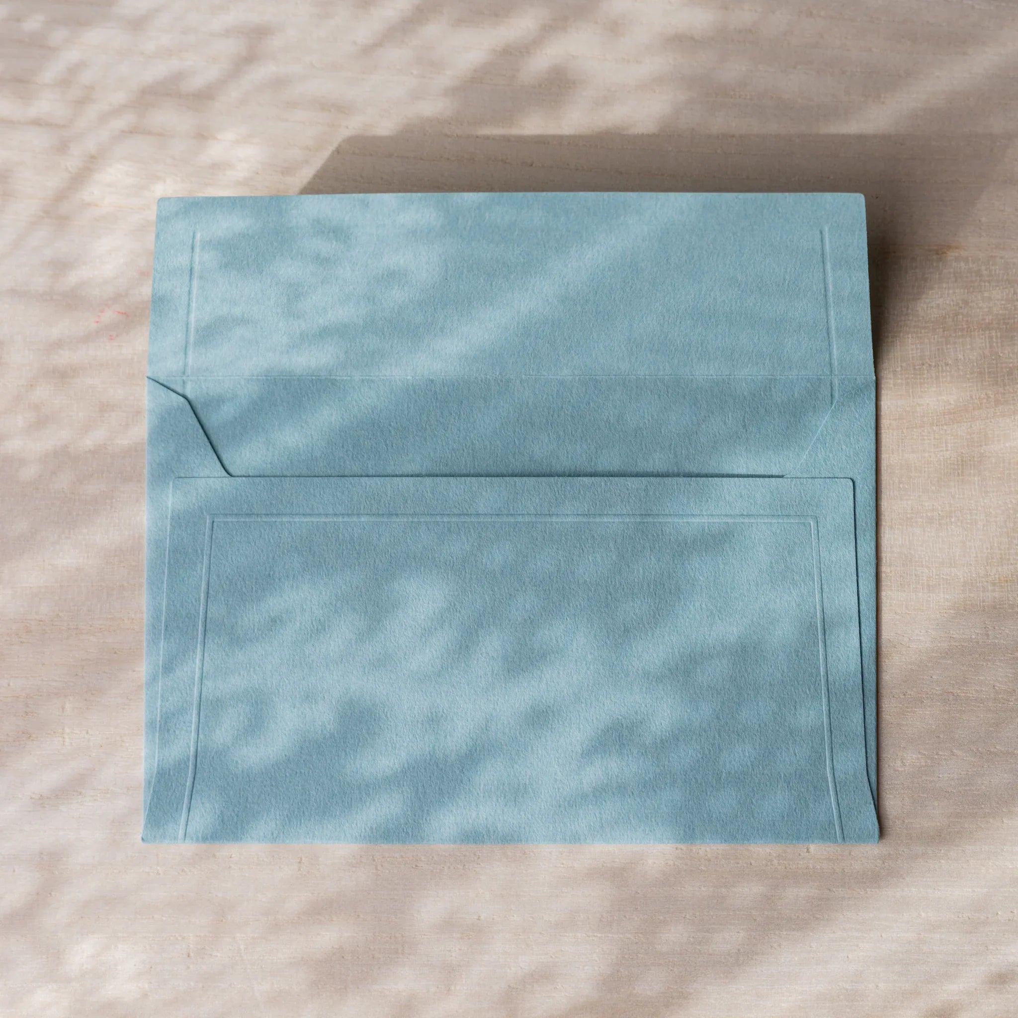 Dressco small embossed envelope set, pastel shade shade, isolated view with embo