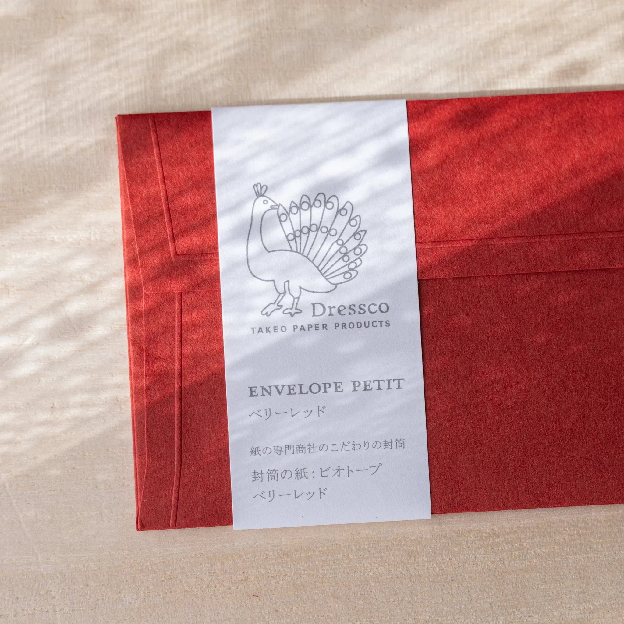 Dressco small embossed, yellow shade, arranged display showing envelope design