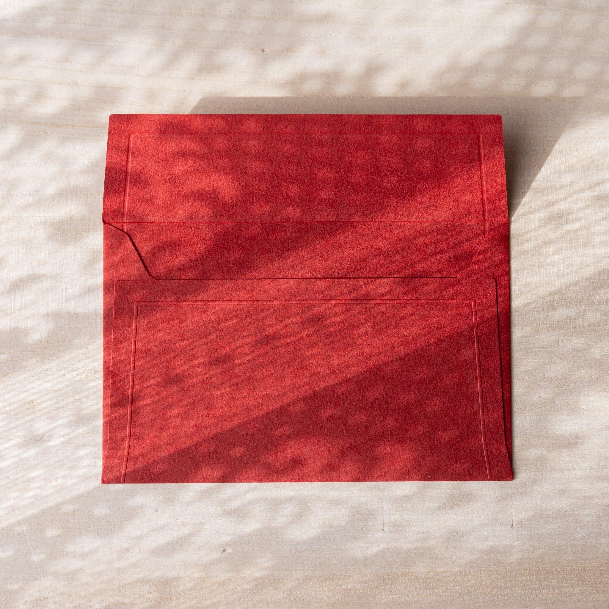 Dressco envelope collection, multicolor, flat lay showing textured composition